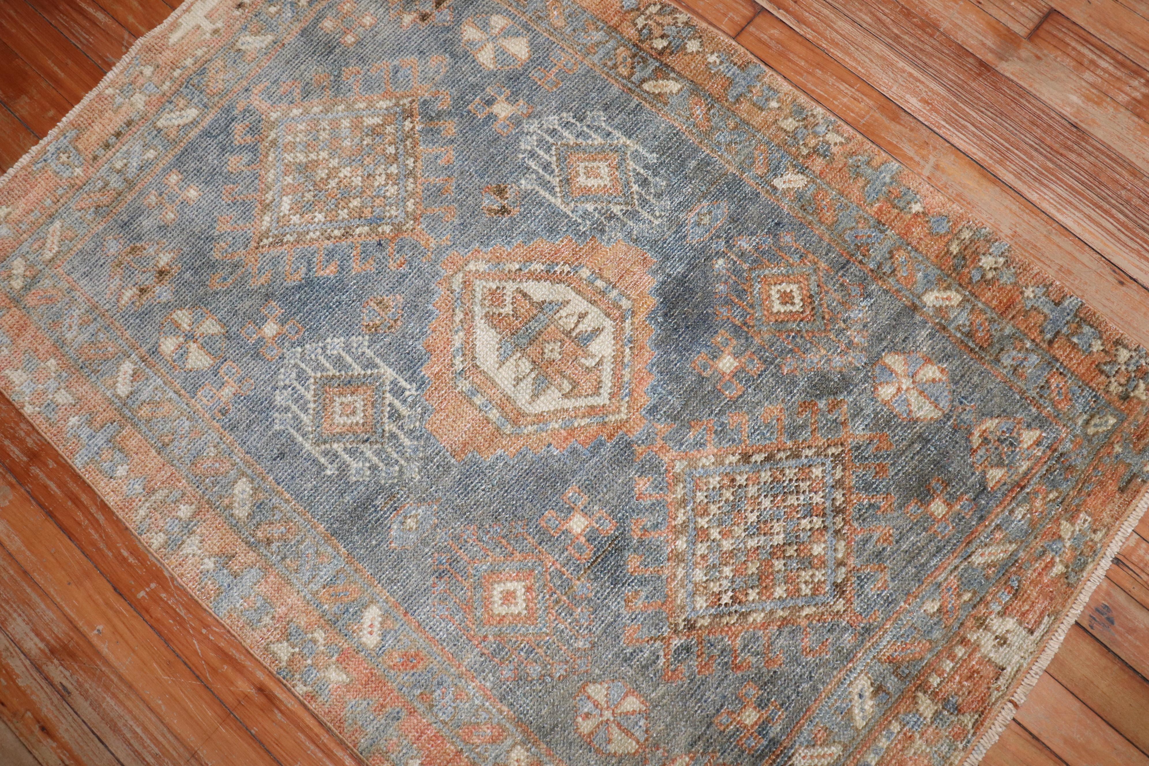 An early 20th-century Persian Heriz small rug.

Measures: 2'10'' x 4'1''.