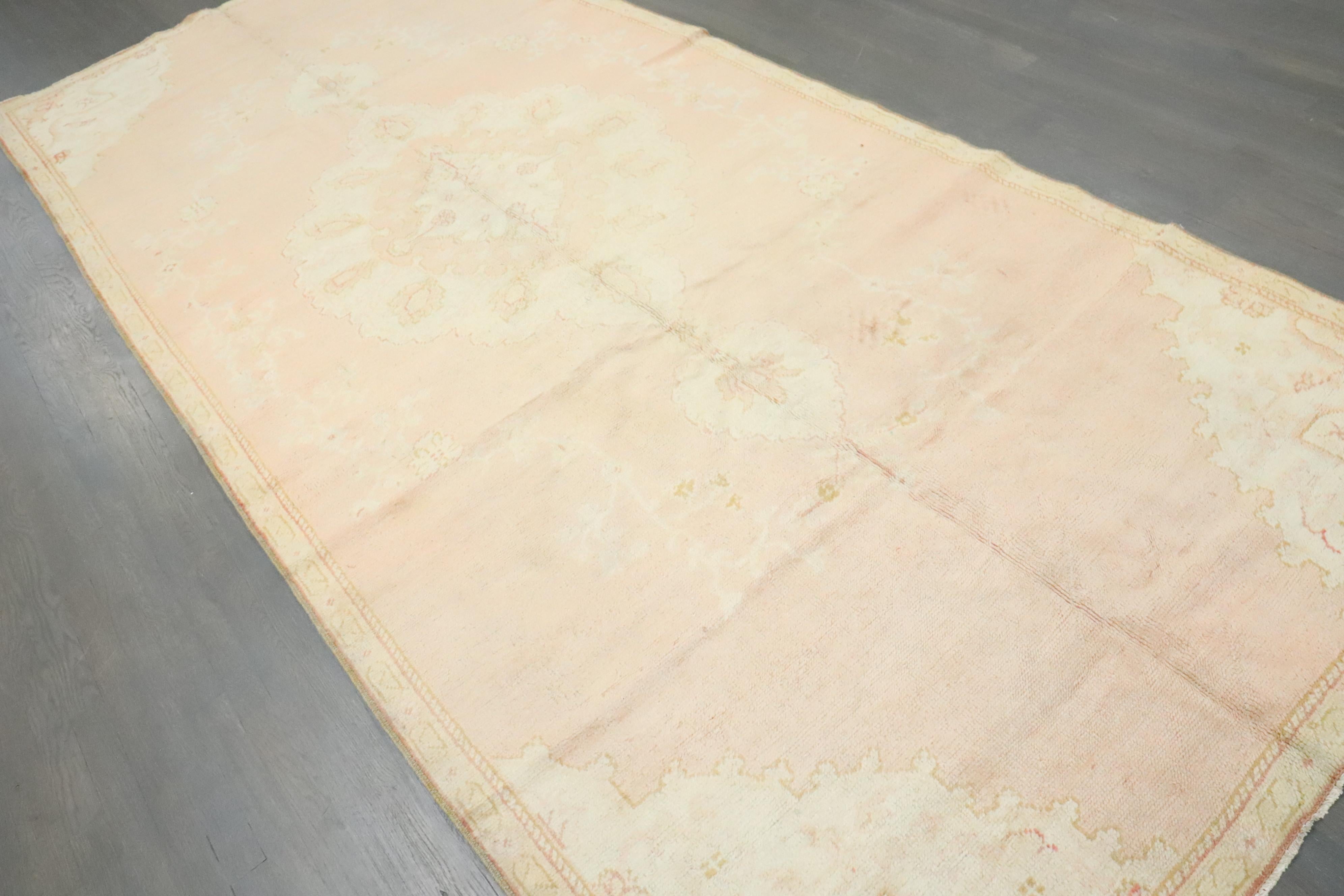 Zabihi Collection Soft Pink Vintage Turkish Oushak Gallery Size Rug In Good Condition For Sale In New York, NY