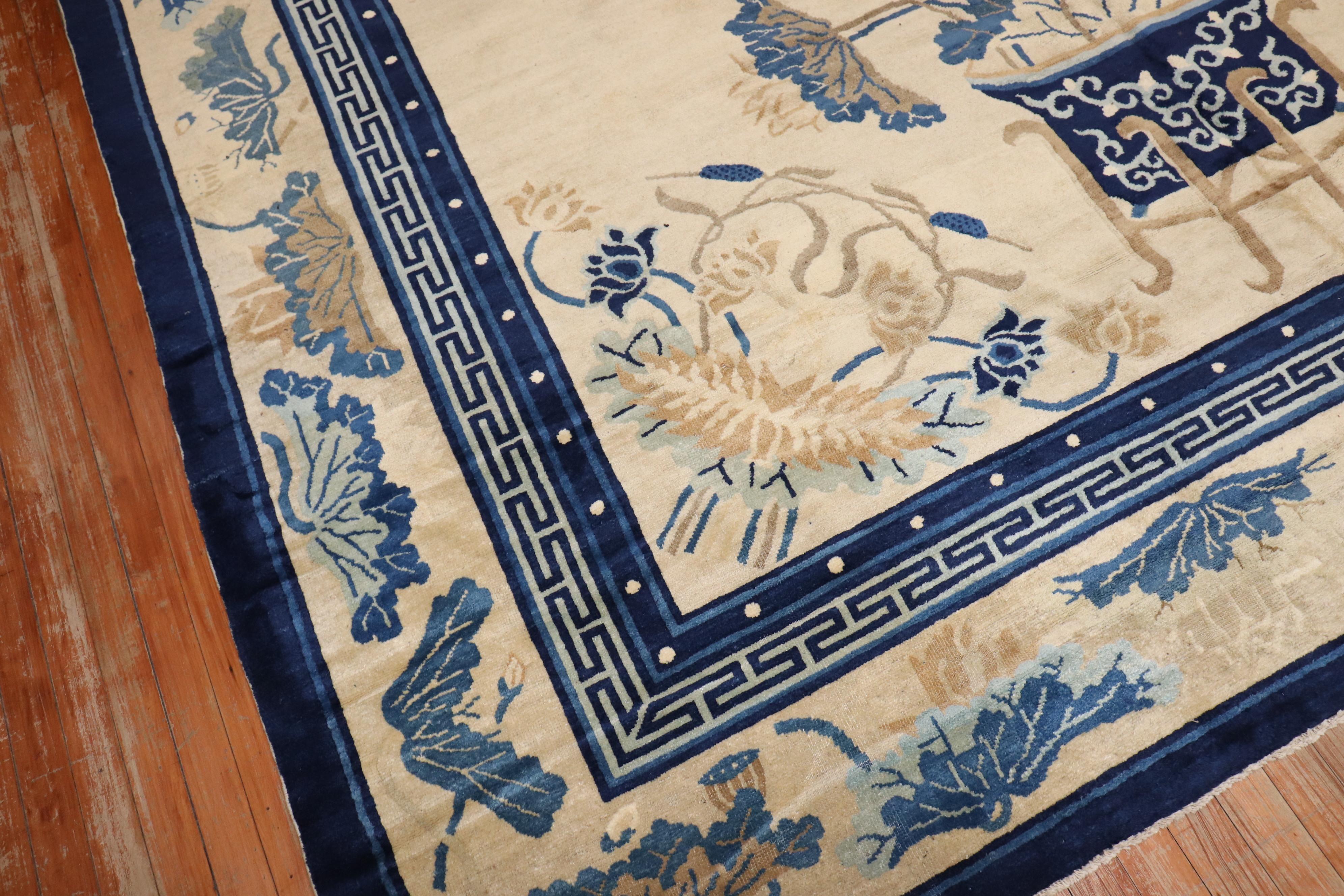 An early 20th century exquisite Chinese Peking rug with an enchanting design and multi-band border in predominant shades of ivory and blue.

8'10'' x 11'7''