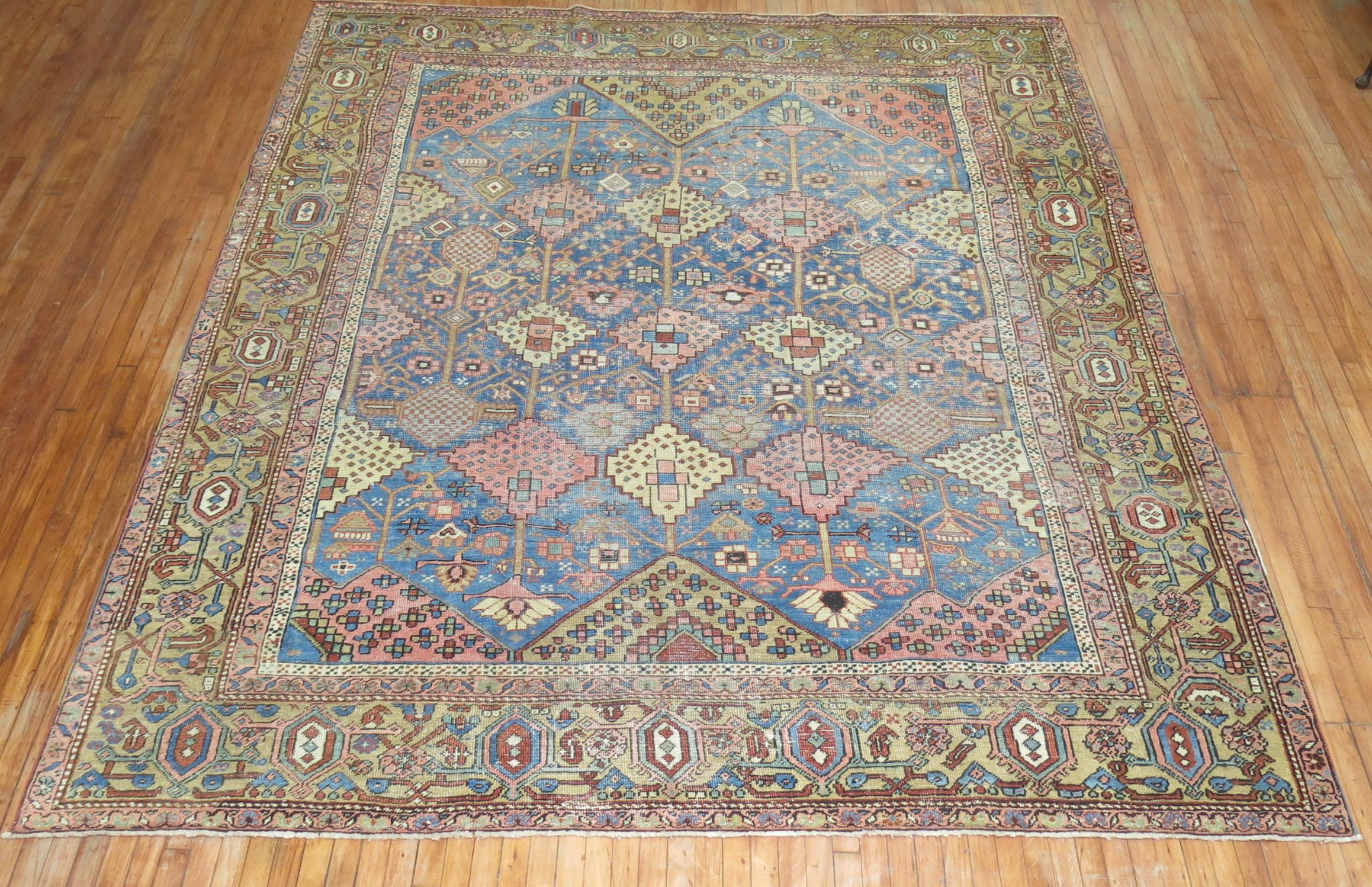 Stunning sky blue field early 20th century decorative Persian Heriz featuring an all-over large scale geometric desigb

Measures: 9'4'' x 11'.