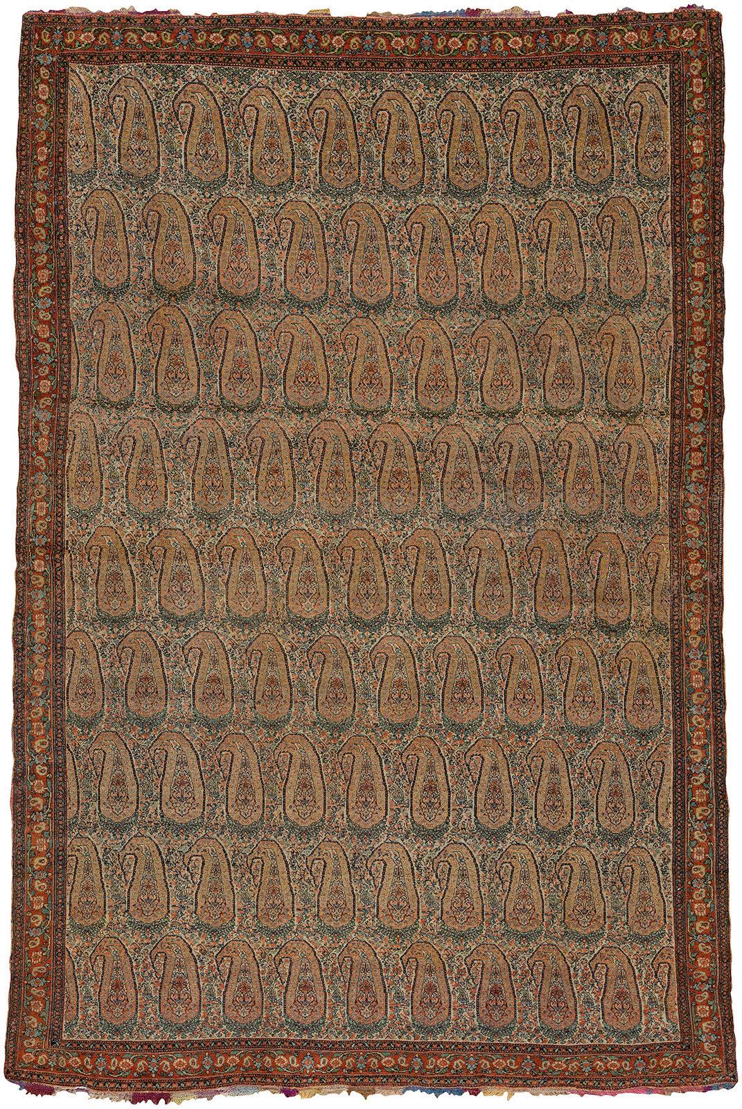 Spectacular collector level finely woven 19th century Persian Senneh rug featuring a large scale paisley design. The weaver added a multicolored fringe that we have never seen.

4'3'' x 6'5''

Antique Senneh rugs are one of the most distinctive