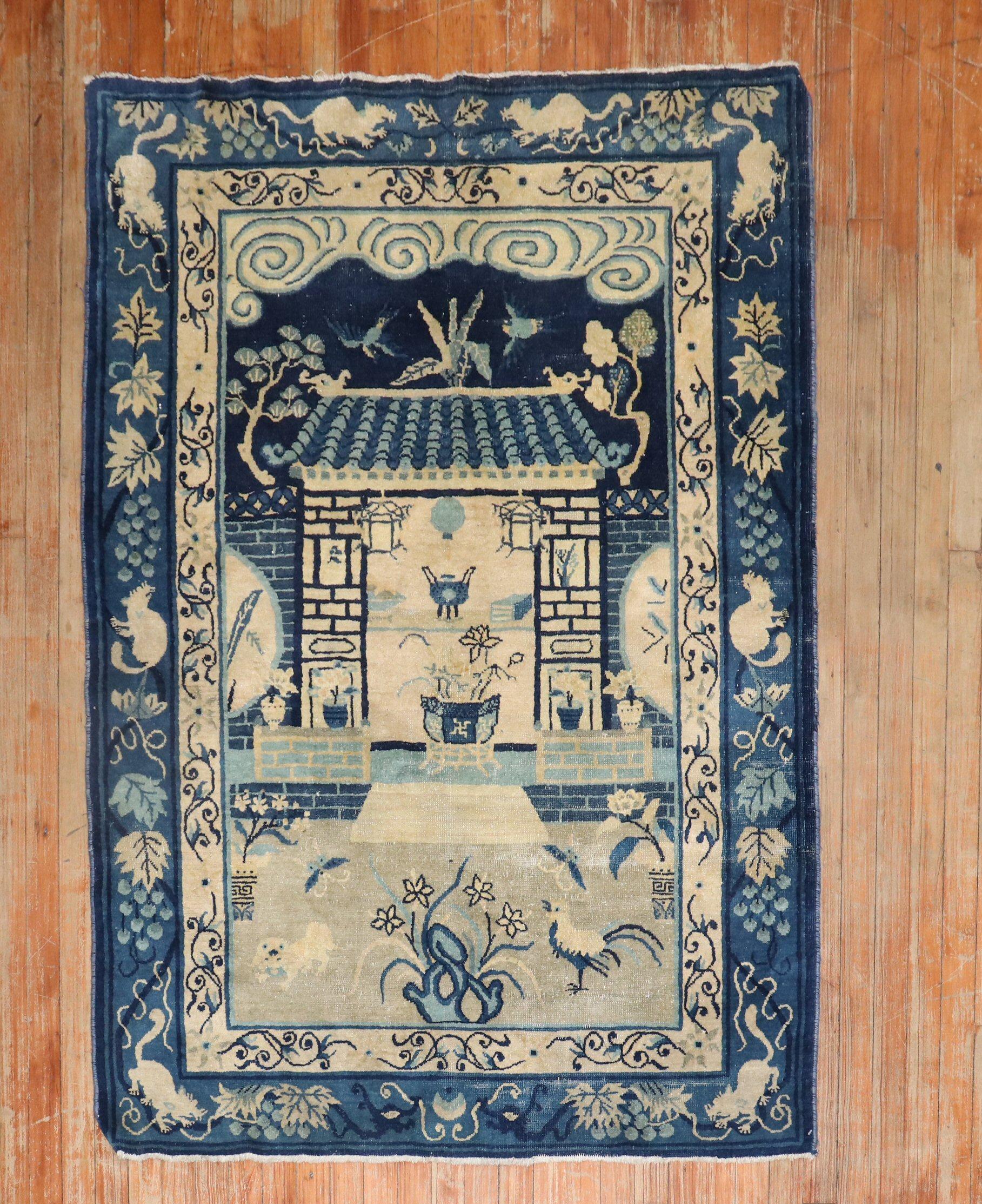An early 20th-century Chinese Peking carpet in tan and blue colors featuring a whimsical motif. 

circa 1920 measures: 4'1'' x 5'9