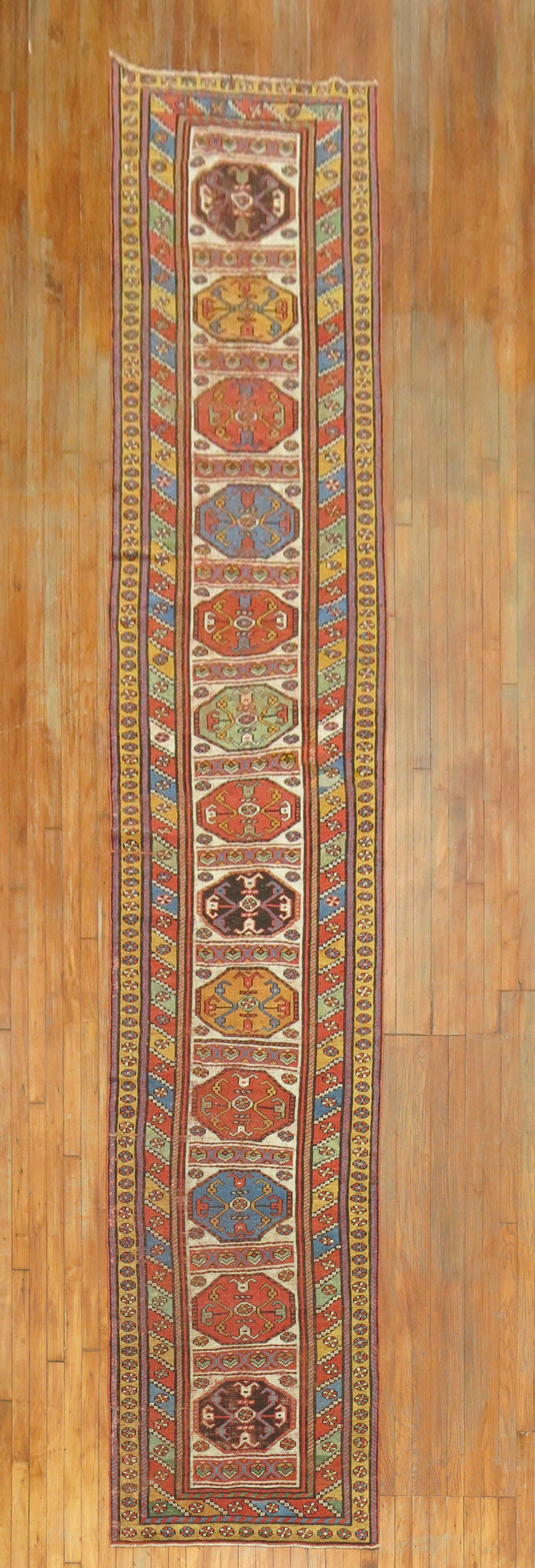 Spectacular tribal Kurdish runner from the 1st quarter of the 20th century

Measures: 3' x 16'5”.