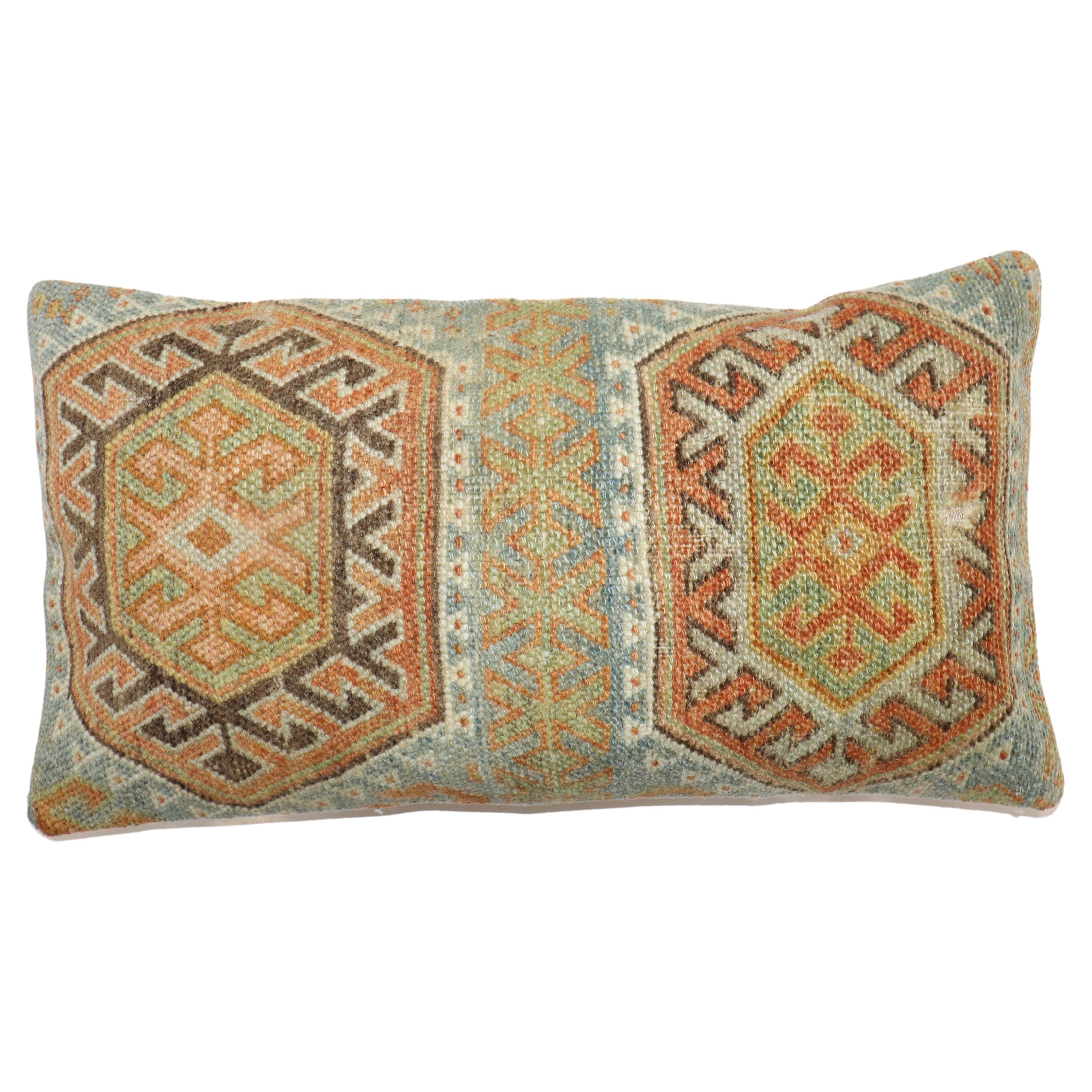 Large Bolster-size pillow made from a Persian Kurd rug. zipper closure and poly-fill insert provided.

Measures: 12'' x 23''.