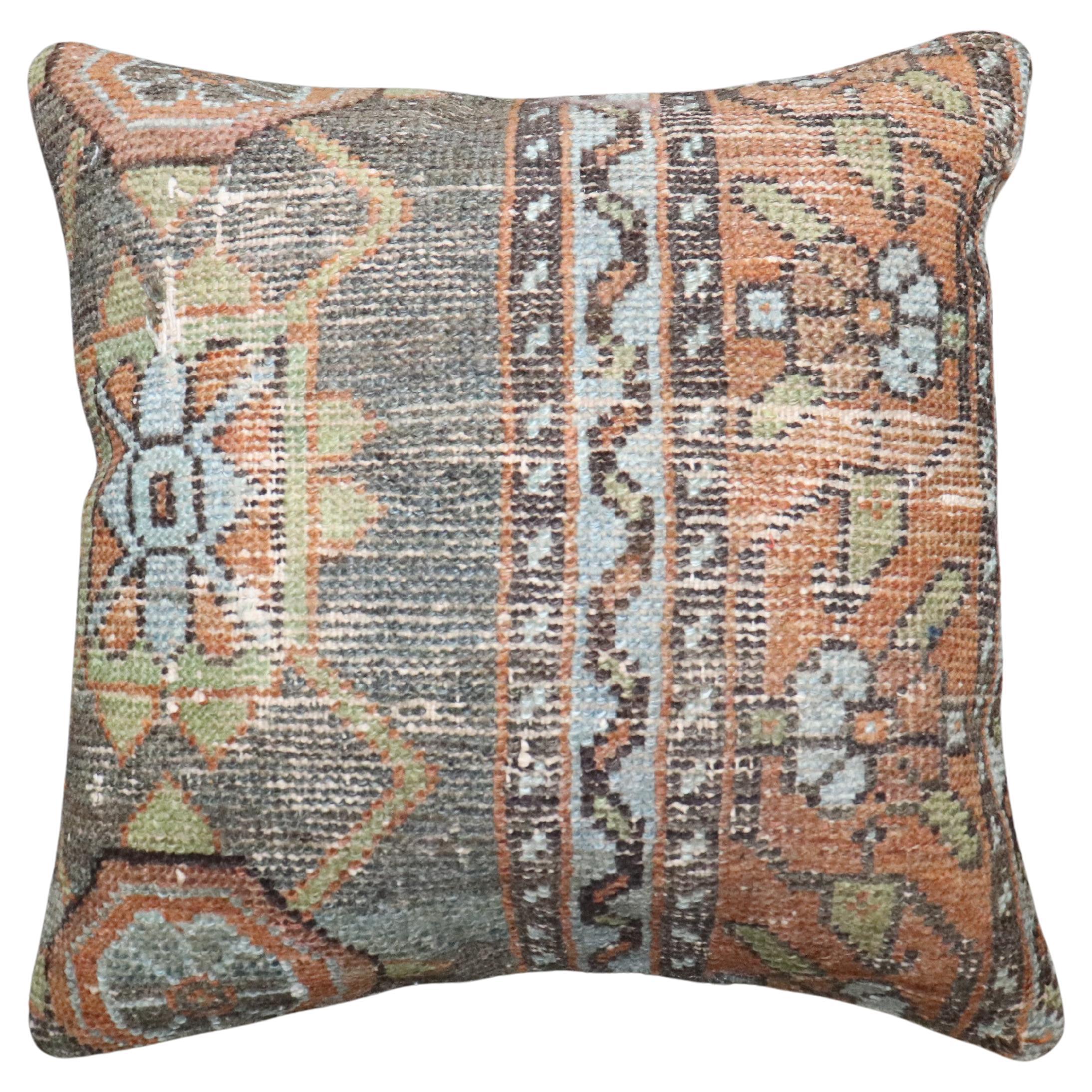 Pillow made from an early 20th-century Antique Persian Kurd Rug. Zipper closure and poly-fill provided.

Measures: 16'' x 16''