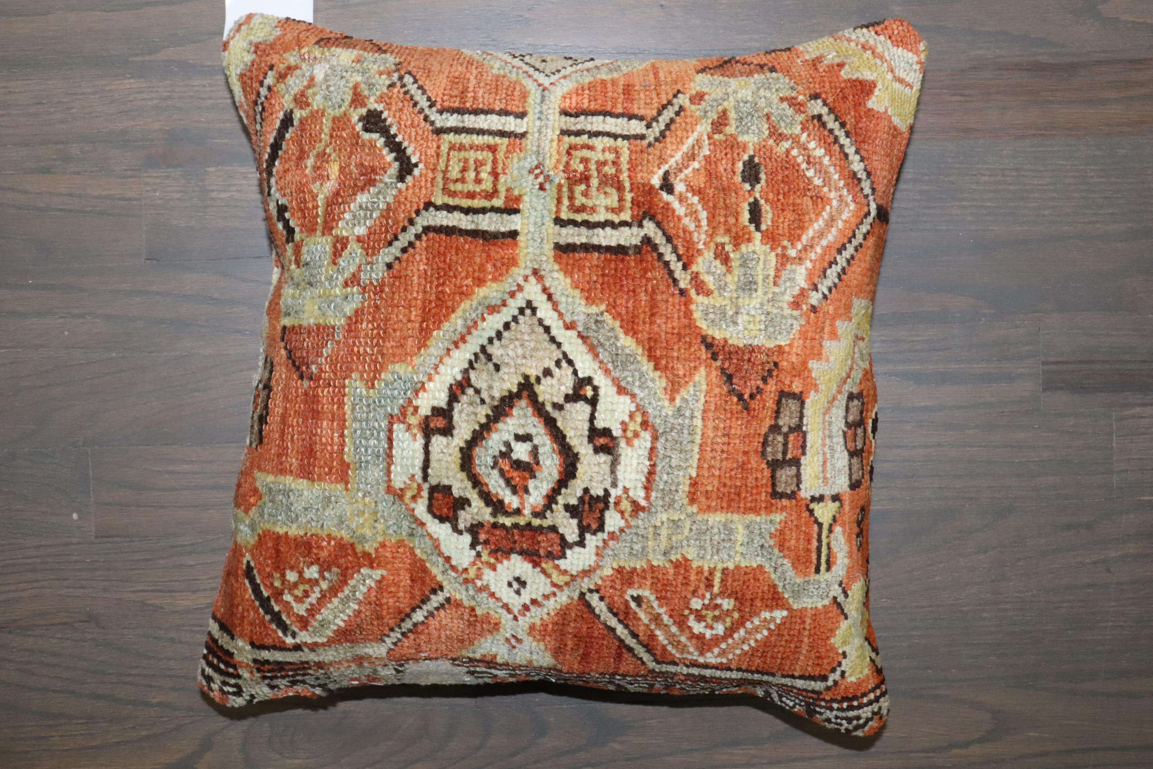 Pillow made from an early 20th-century Antique Persian Rug. Zipper closure and poly-fill provided.

Measures: 16'' x 16''