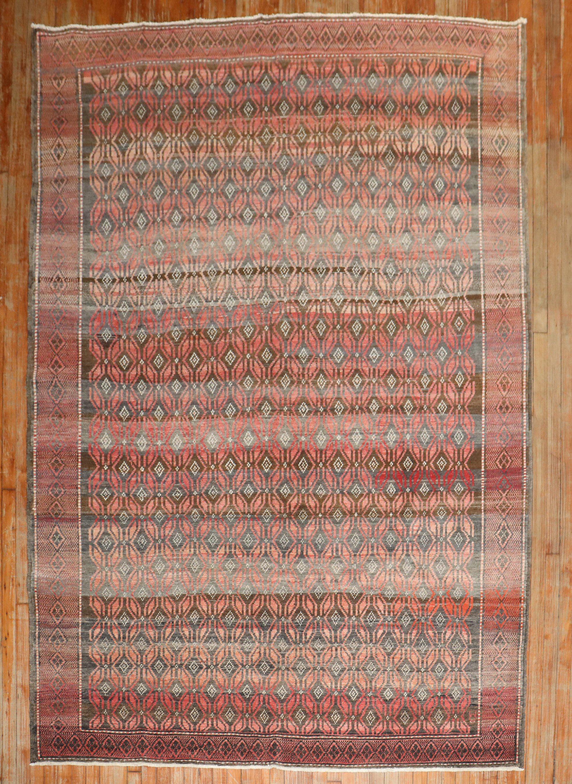 Mid 20th Century High Decorative Turkish Tribal Rug

6'8'' x 9'4''

Kars is a village located in Northeast of Turkey. The weavers in this area tend to make long runners and long odd size gallery rugs, with large medallions often in the form of large