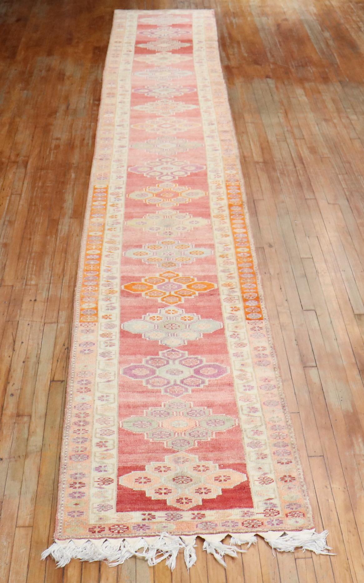 A rare long Turkish Anatolian runner from the middle of the 20th century. 

Measures: 2'10” x 20'10”.