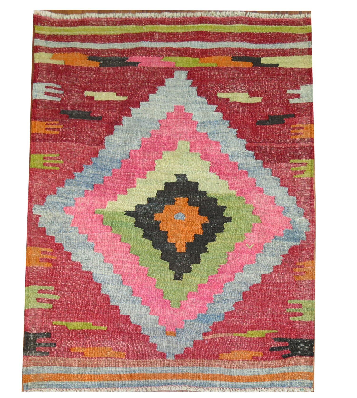 a fun Mid-20th Century Tribal Turkish Kilim

Measures: 3'5'' x 4'4”
