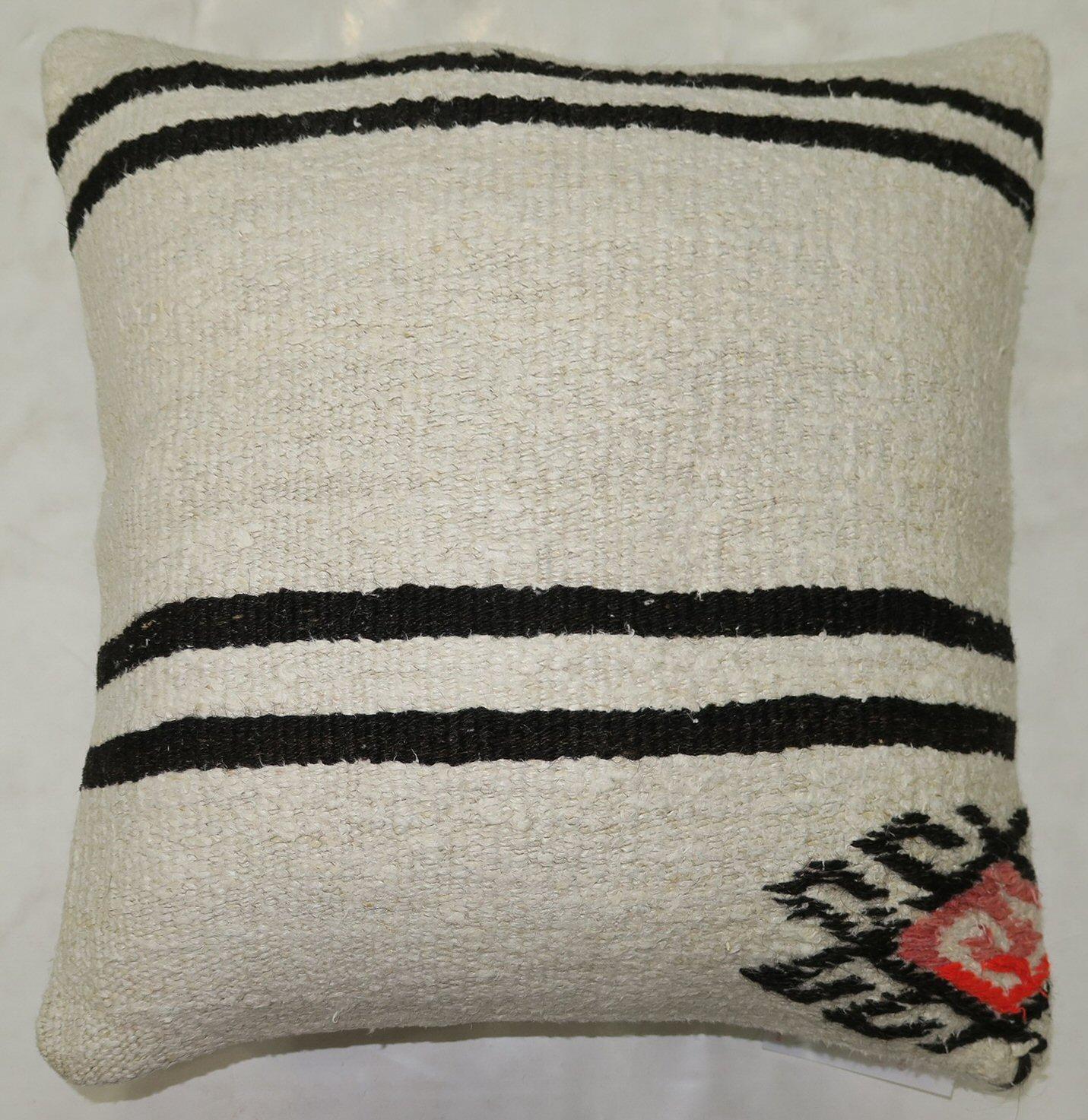 Pillow made from modern Turkish Kilim Zipper closure and poly-fill insert provided.

Measures: 17