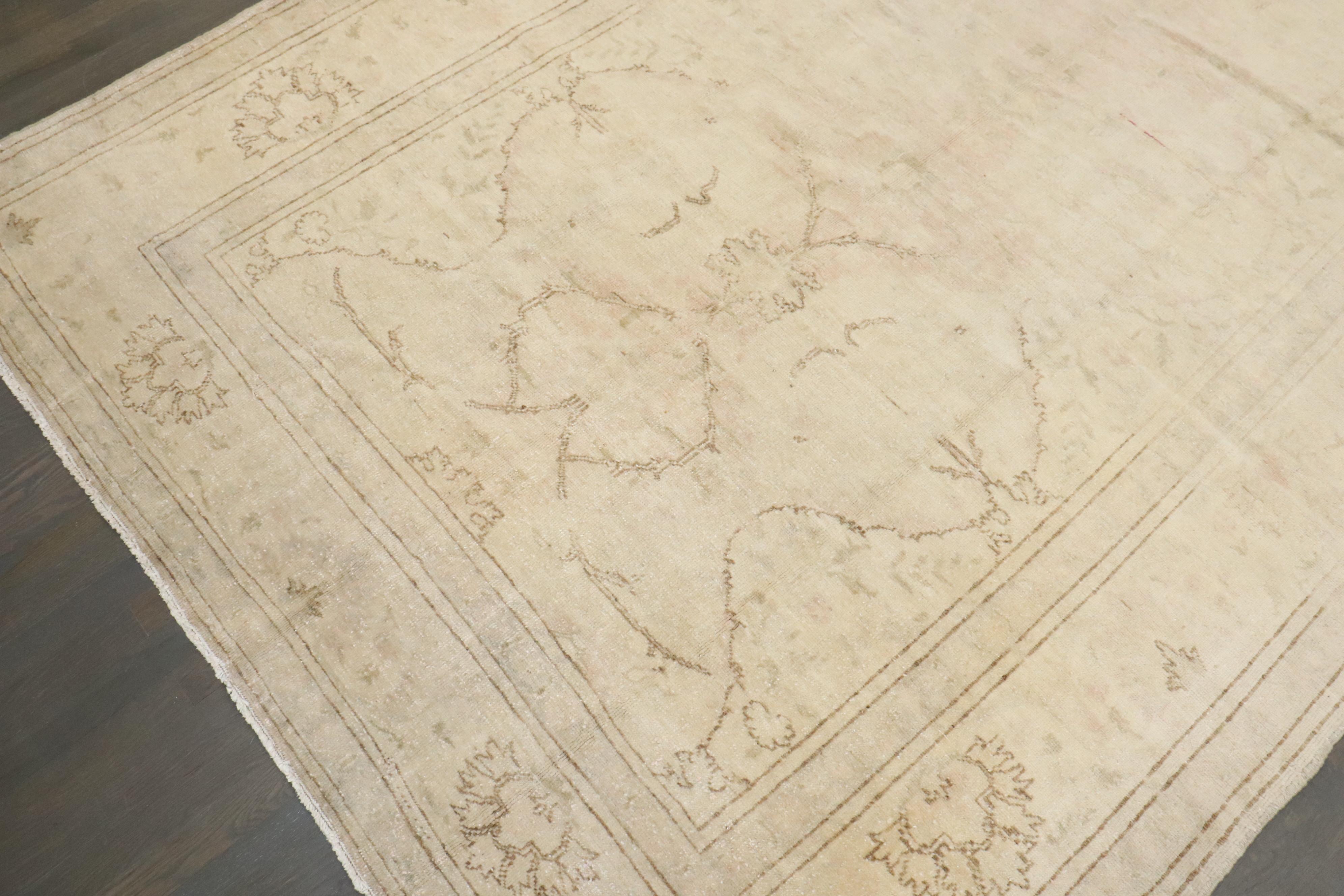 A one-of-a-kind handmade mercerized cotton pale Turkish rug

6'7'' x 9'11''