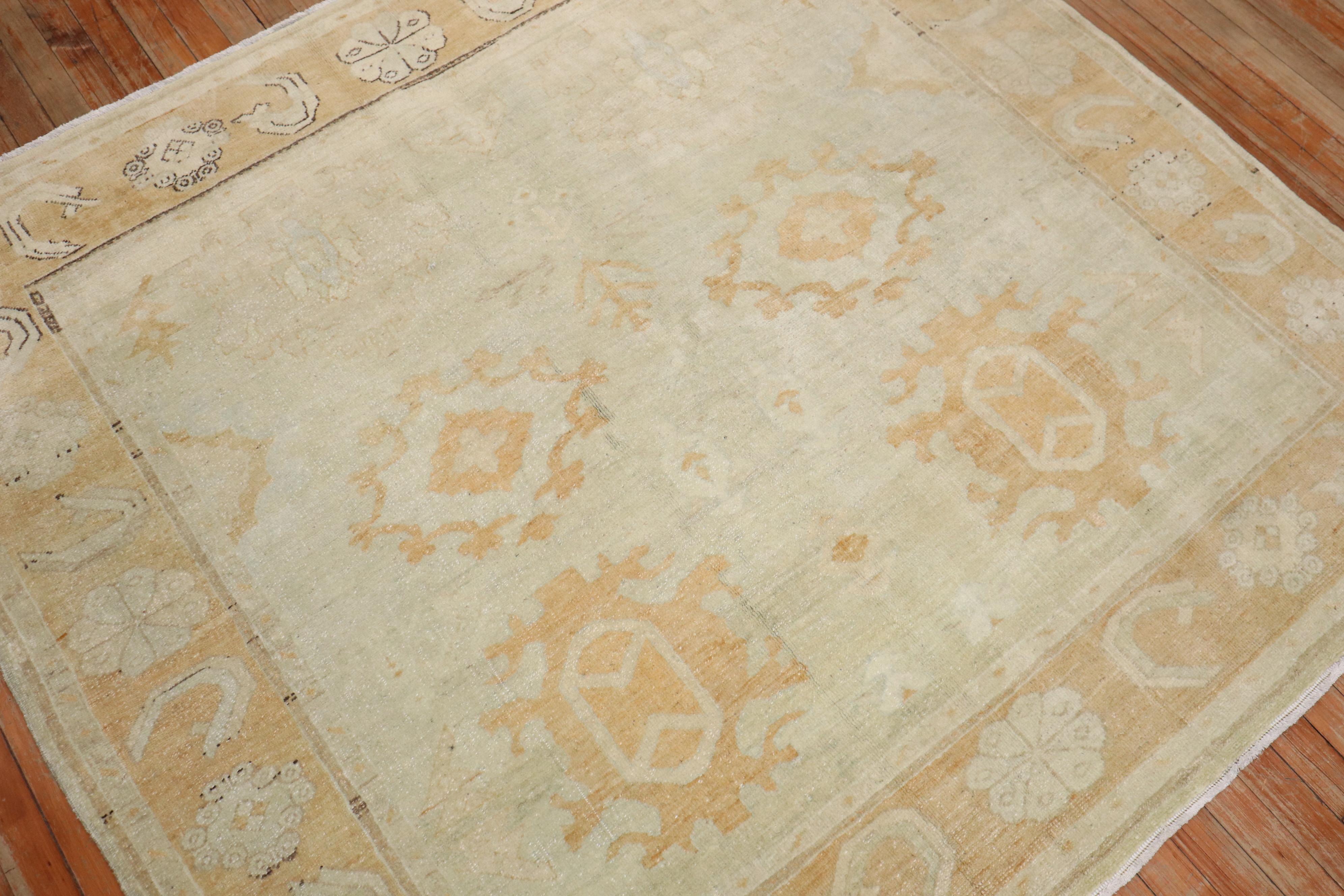 A square-shaped  Turkish  Oushak rug from the 3rd quarter of the 20th century. 

Measures: 5'5'' x 5'11