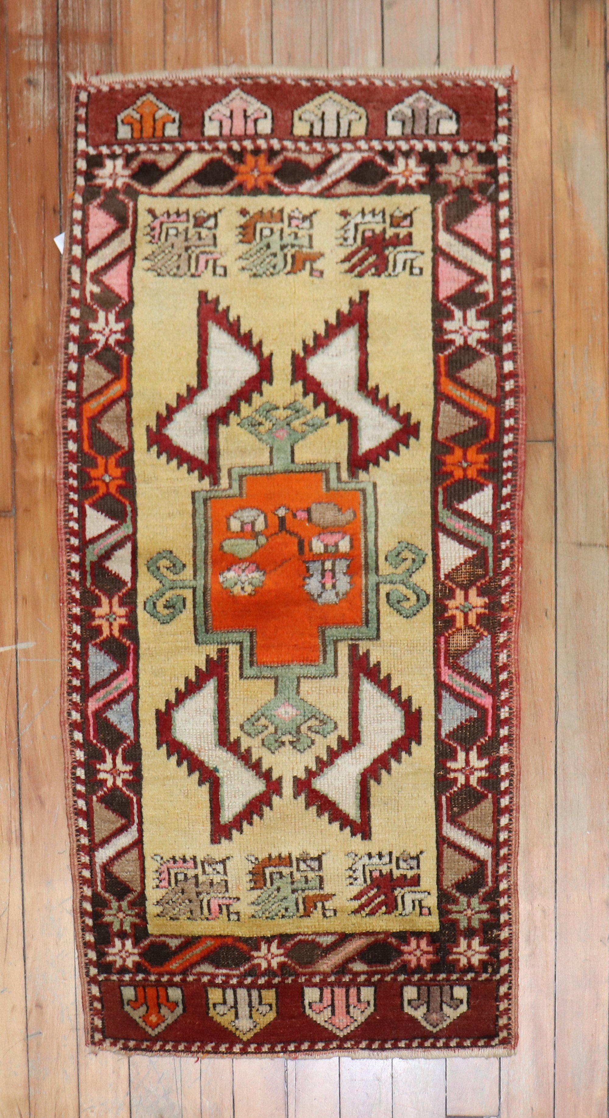 
An early 20th-century Turkish Yastik Antique Rug

Measures: 1'7” x 3'3”.