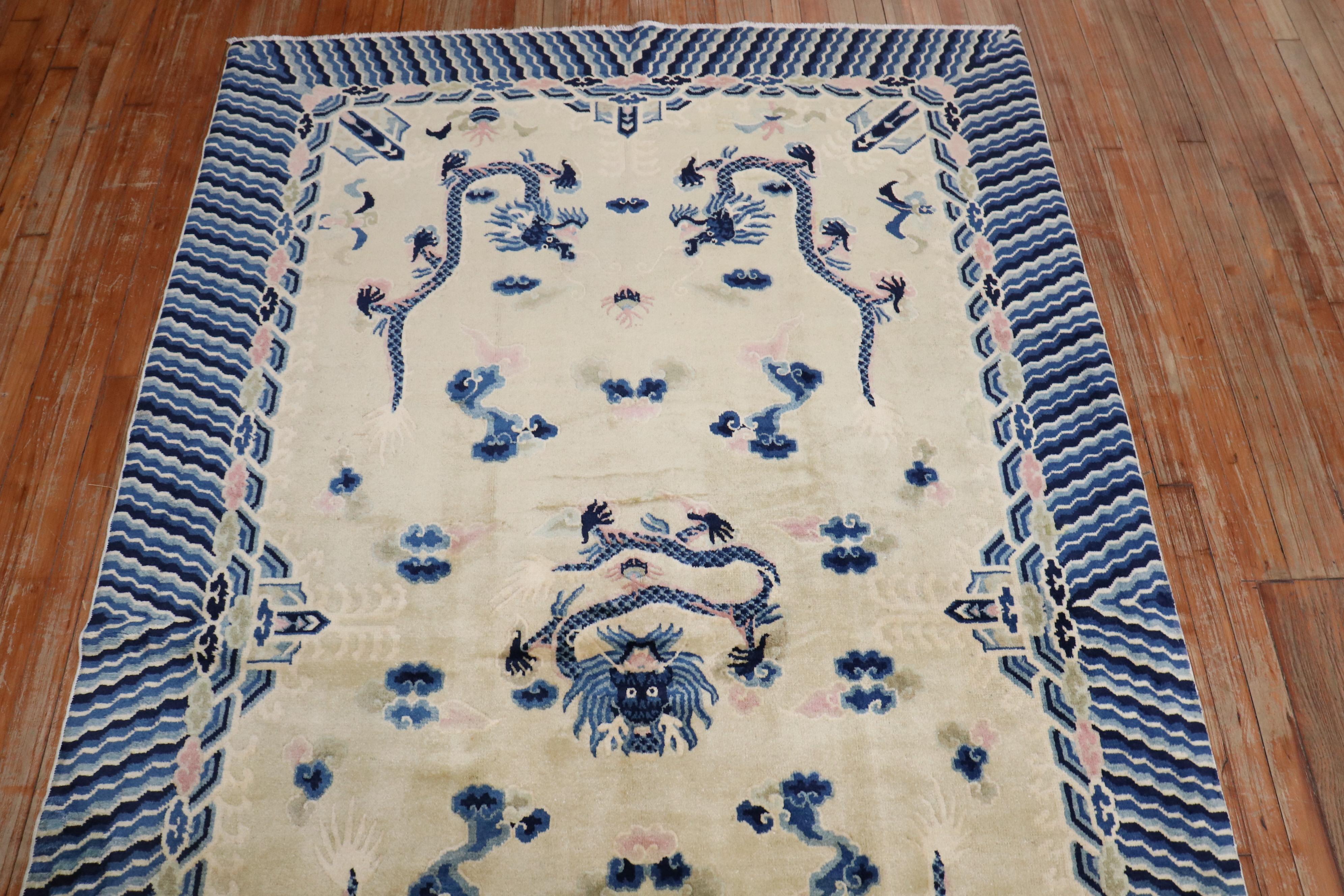 A late 20th-century  one of a kind hand-knotted Chinese  rug with a dragon motif 

Measures: 5'2'' x 8'1''