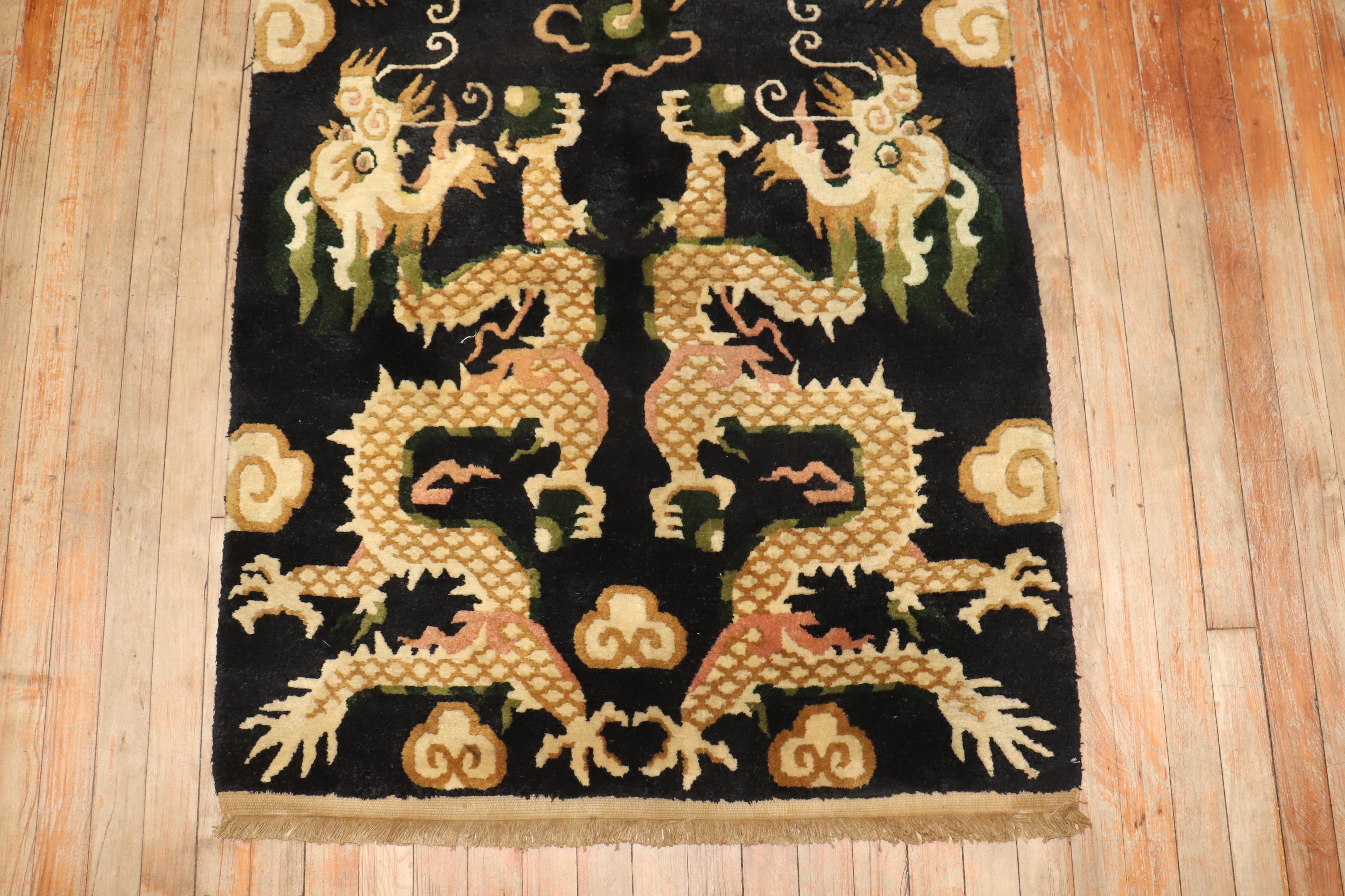 3rd quarter of the 20th century tibetan rug with a dragon motif

Details
rug no.	j3880
size	3' 1