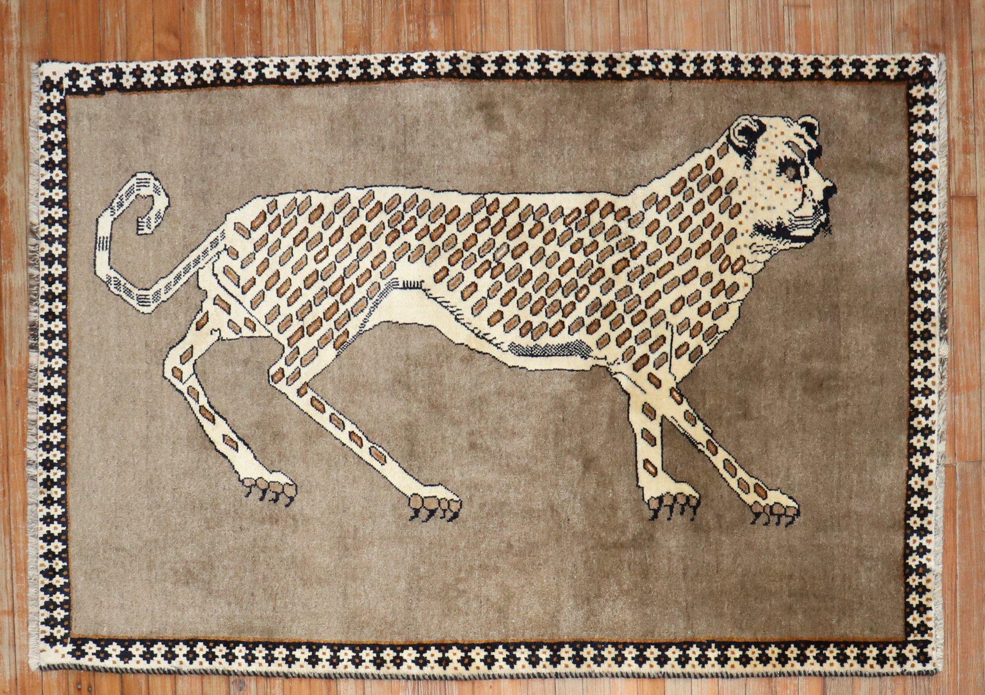 Late 20th century Persian Gabbeh Rug witha large cheetah walking on a sold brown field.

Details
rug no.	j3628
size	3' 10