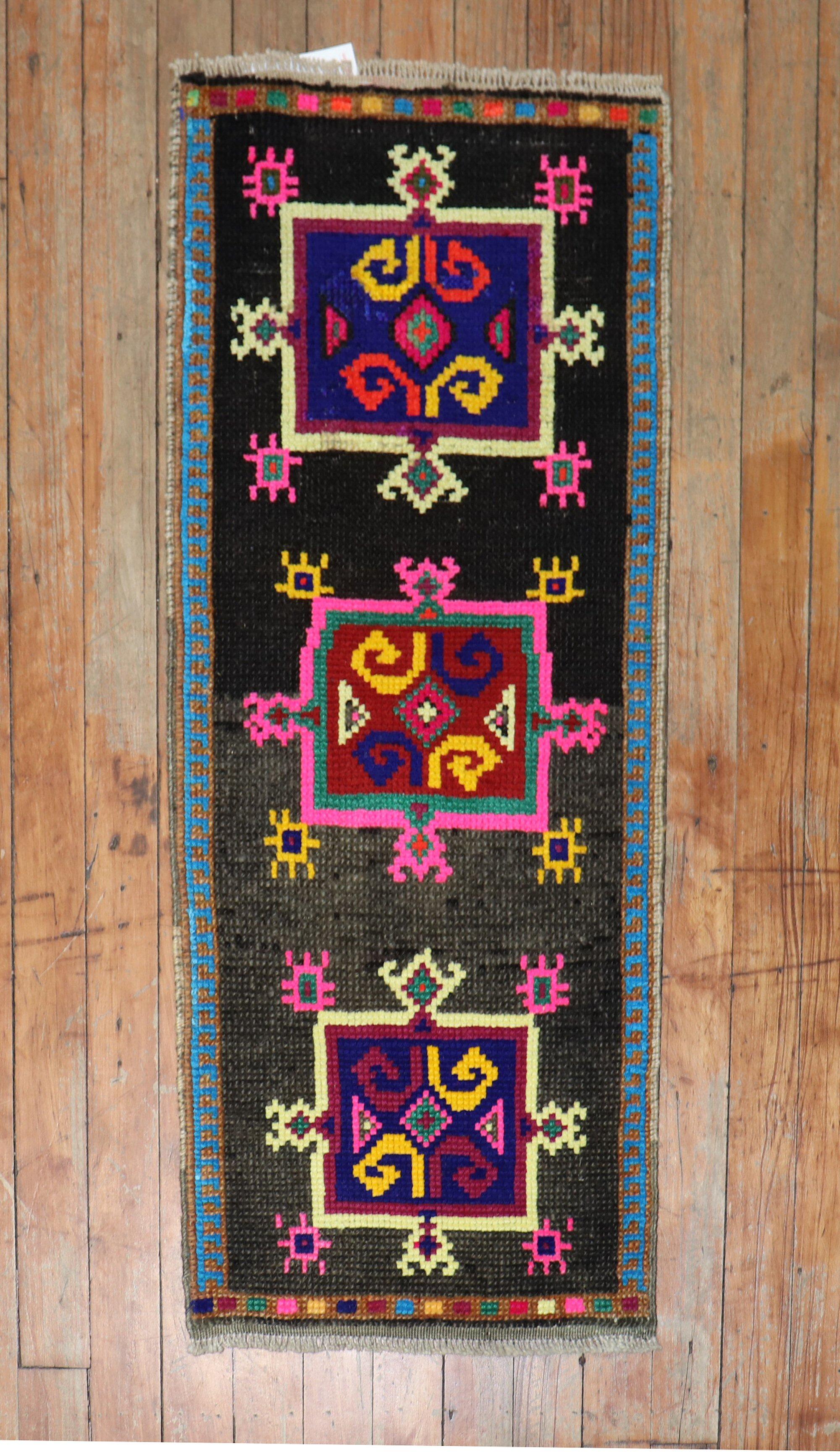 Mini size mid 20th century Turkish Anatolian rug

Measures: 1'4'' x 3''1'