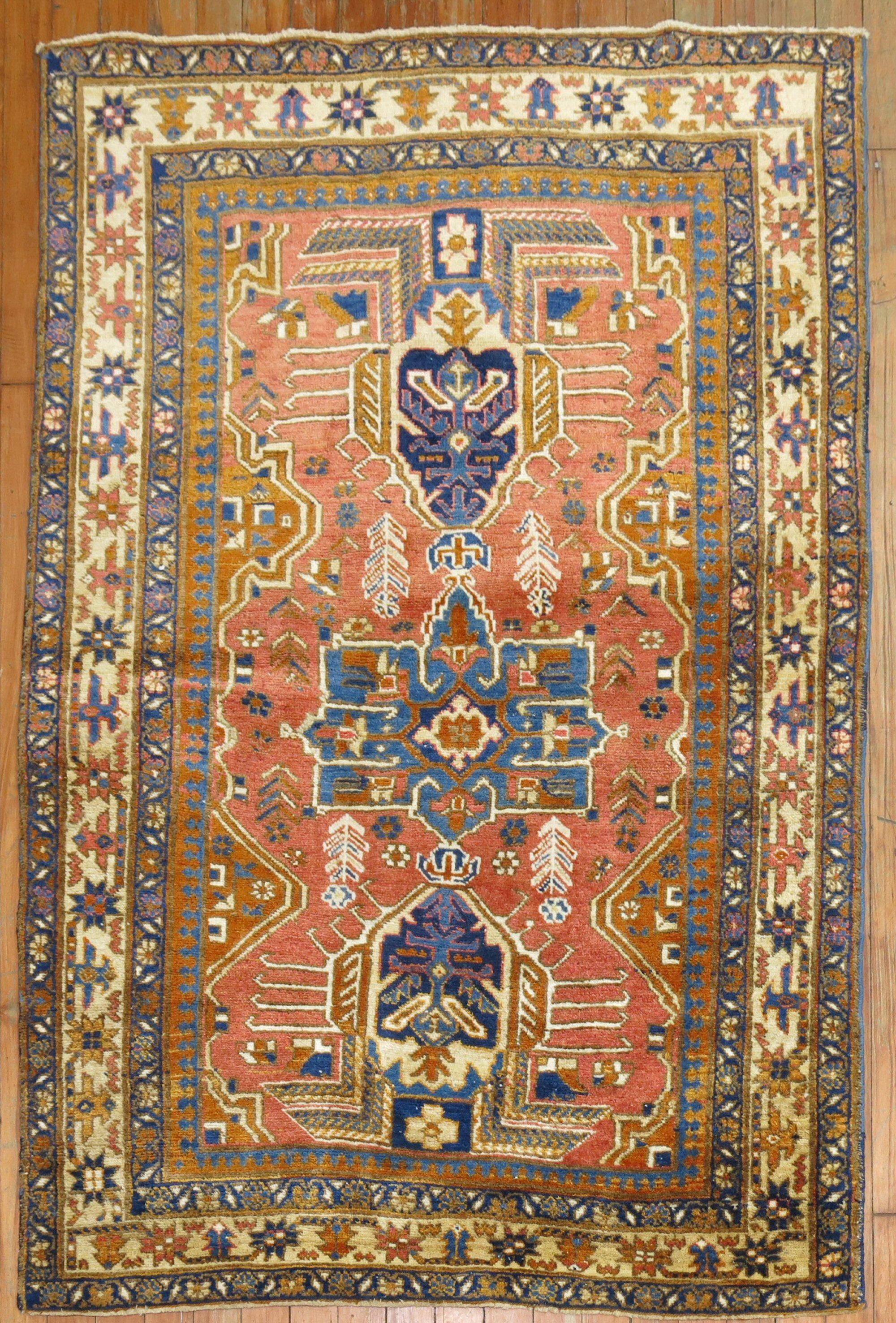 Mid 20th Century Persian Heriz

Measures: 3'4'' x 4'9''

Heriz carpets are beloved for their versatility. Their geometry complements modern furnishings and their warm colors and artistic depth enhance antiques of all kinds. Their richness of color