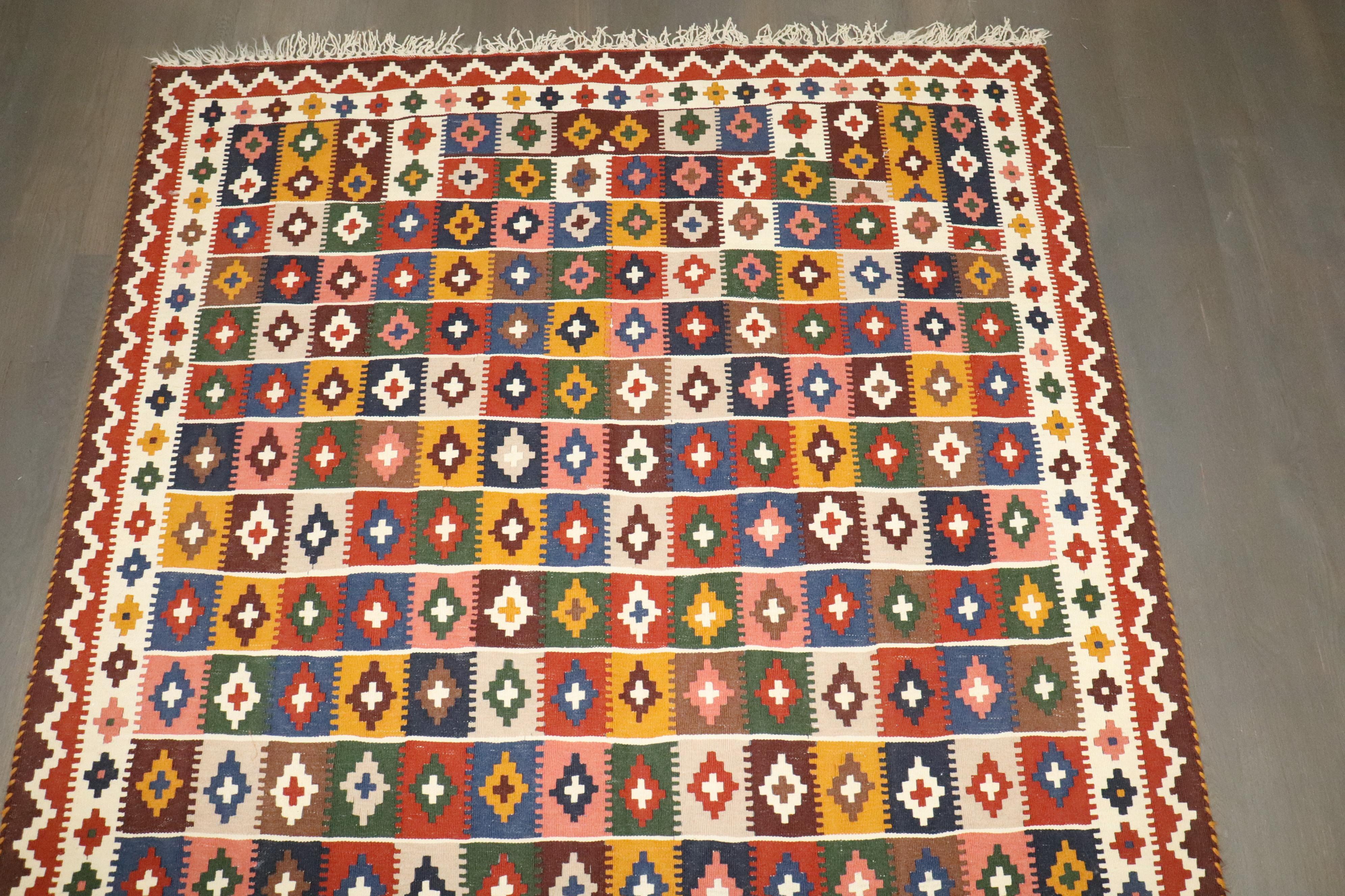 a mid-20th-century Century Colorful Persian Qaushgai Kilim

Details
rug no.	j4672
size	5' x 9' 5