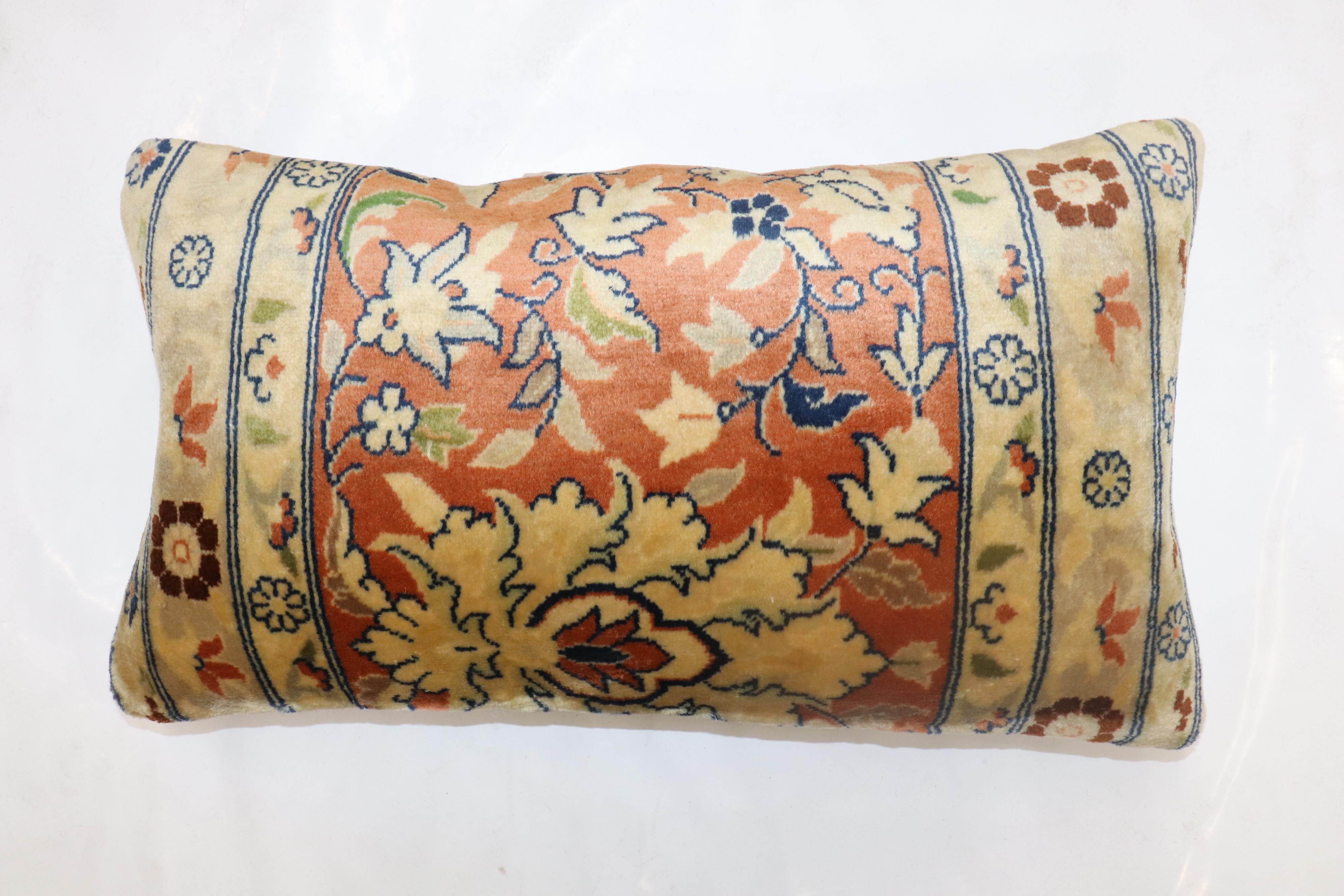 Pillow made from a vintage Persian Tabriz Rug

15'' x 25''