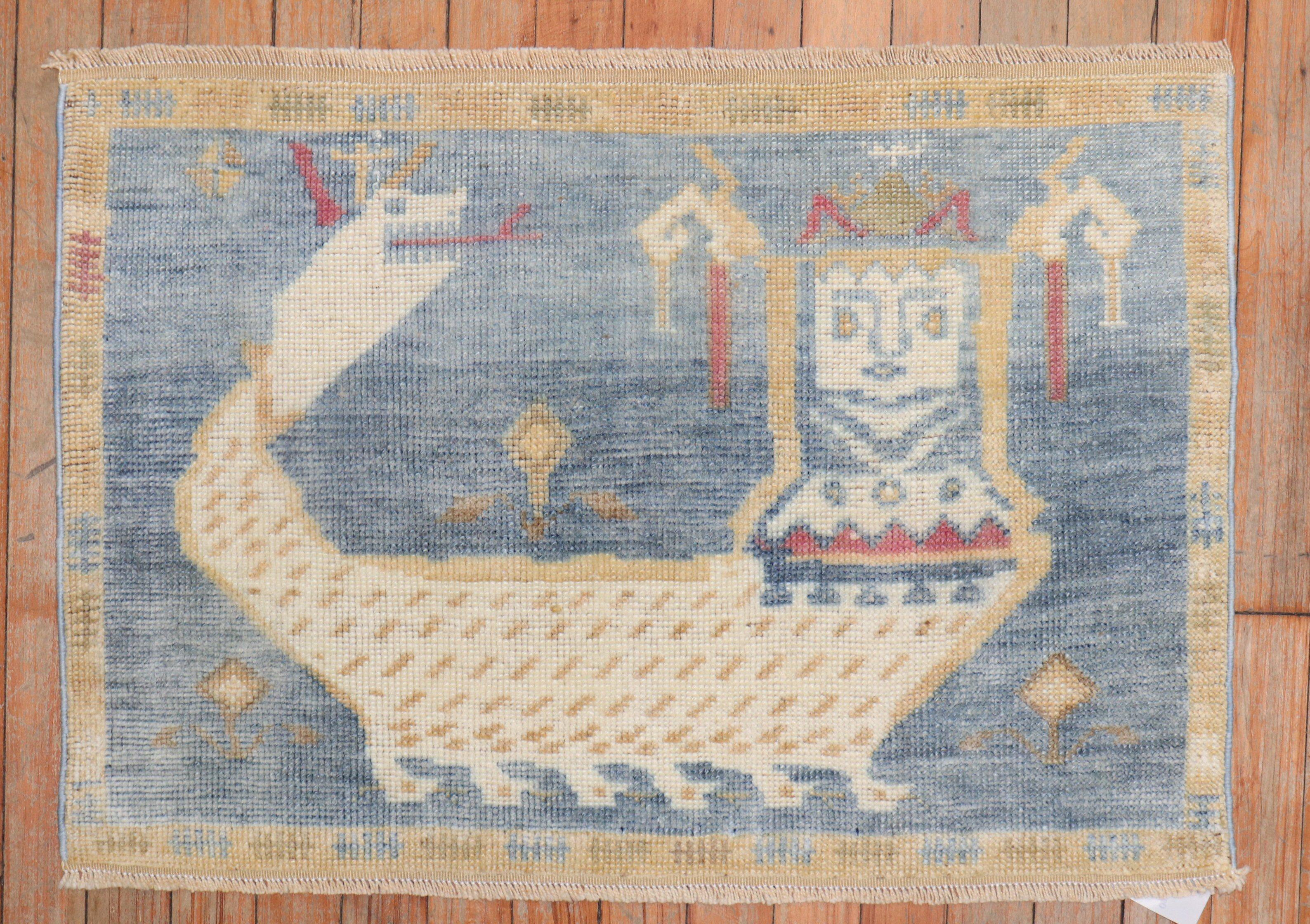 Zabihi Collection Vintage Soft Blue Pictorial Turkish Rug In Good Condition For Sale In New York, NY