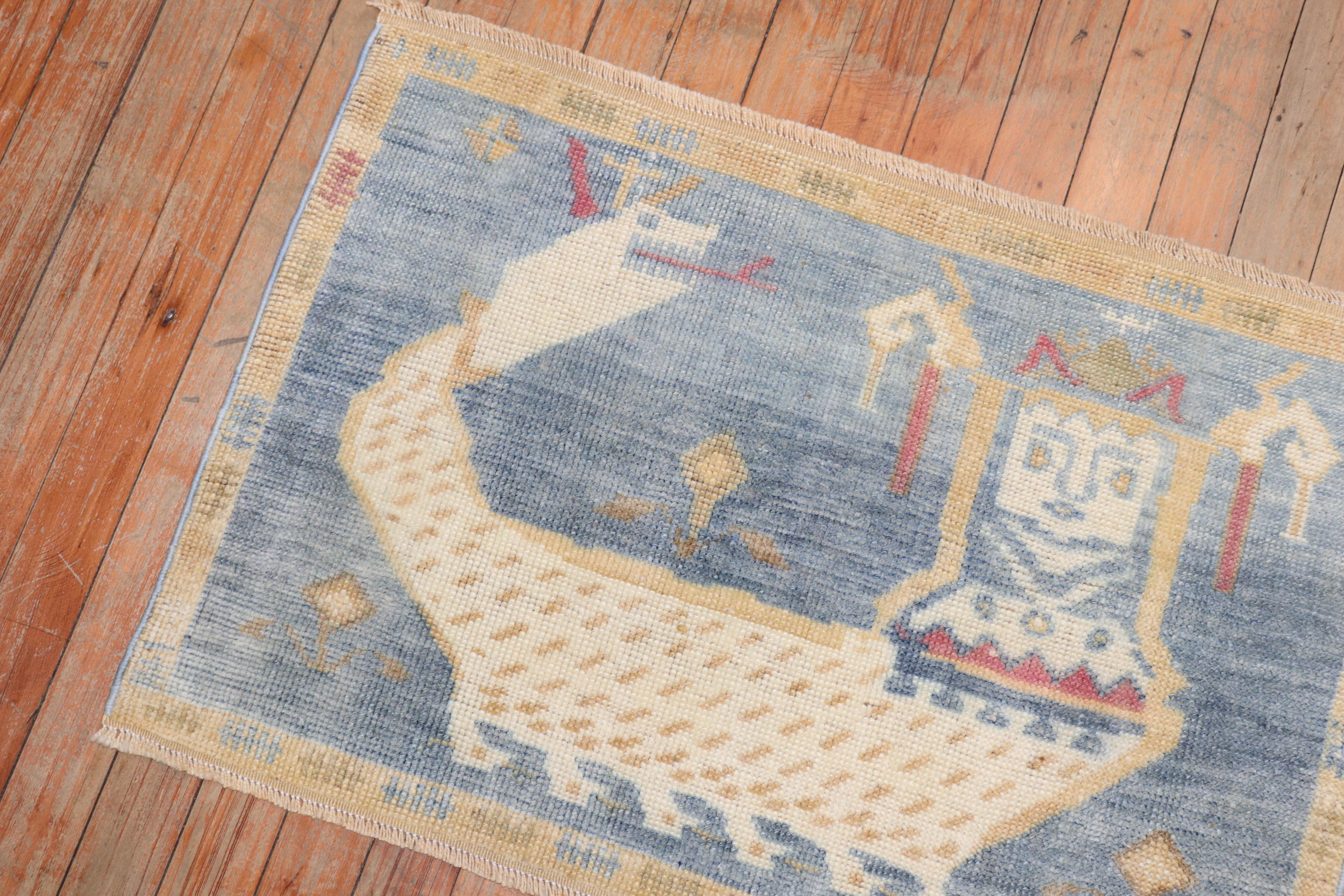 20th Century Zabihi Collection Vintage Soft Blue Pictorial Turkish Rug For Sale