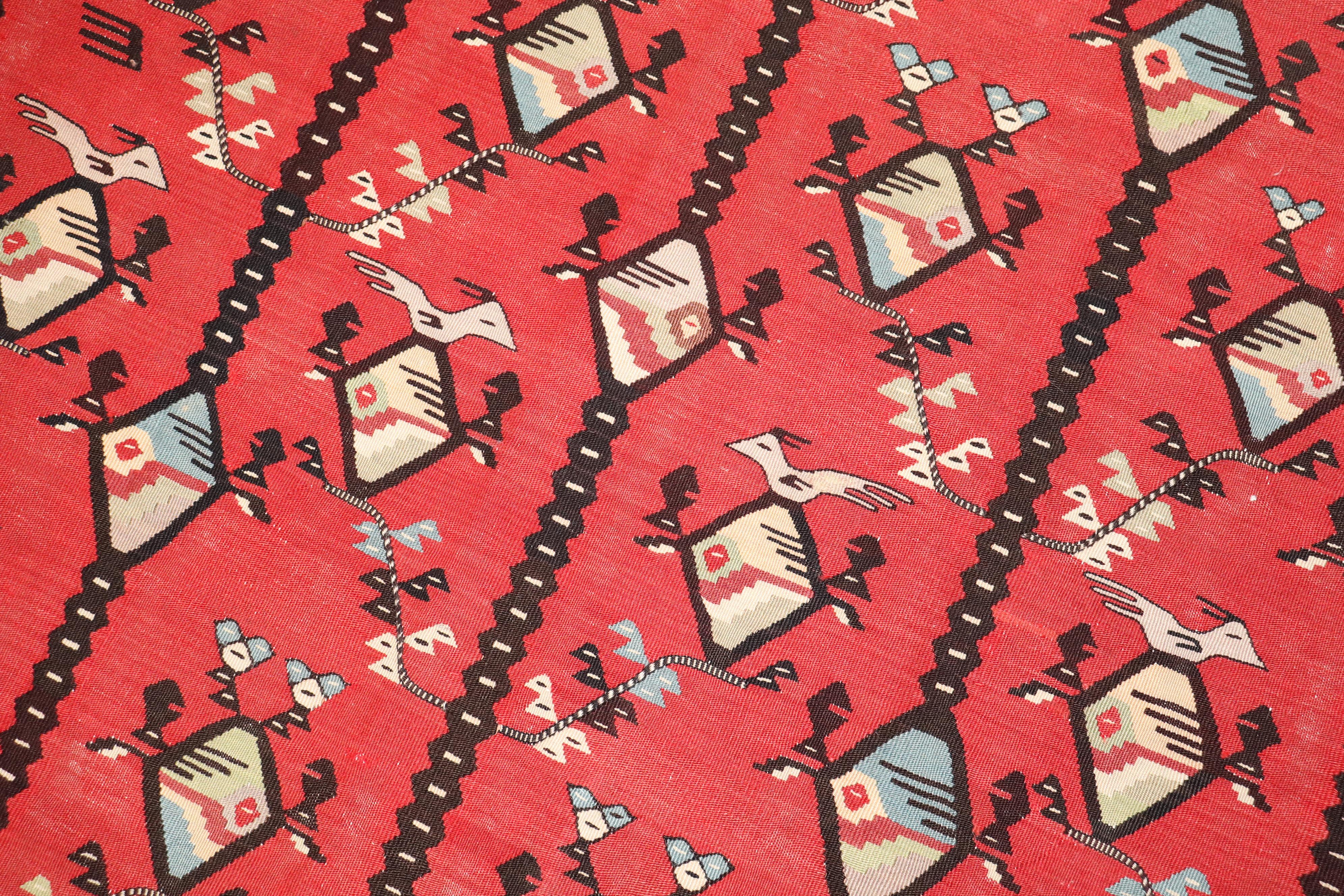 A Square Size Turkish Kilim with a geometric design on a red field from the middle of the 20th century

Details
rug no.	j2368
size	7' x 8' (213 x 244 cm)