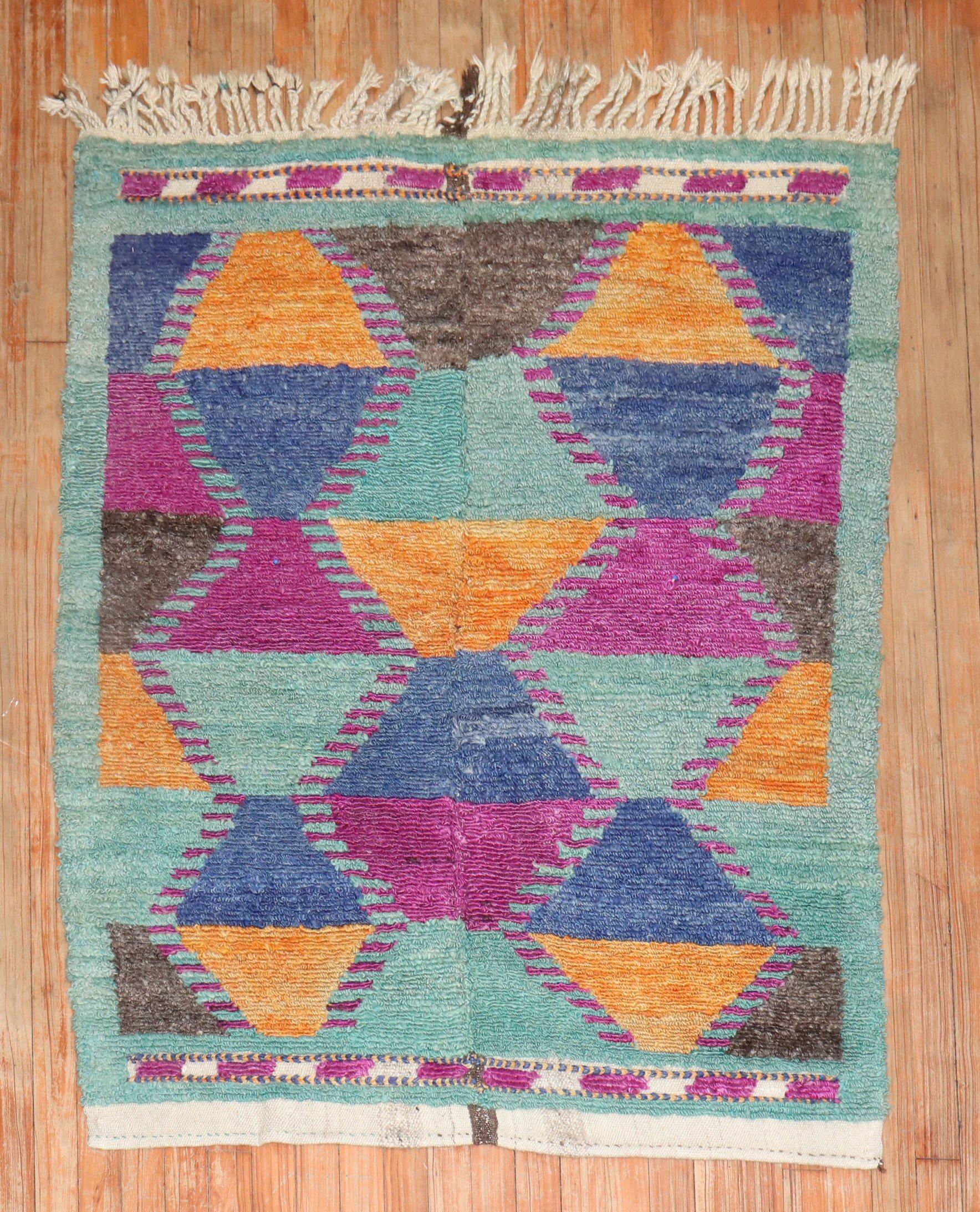A 3rd quarter of the Century Turkish Tulu shag rug with bright funky colors.

3'7'' x 4'7''