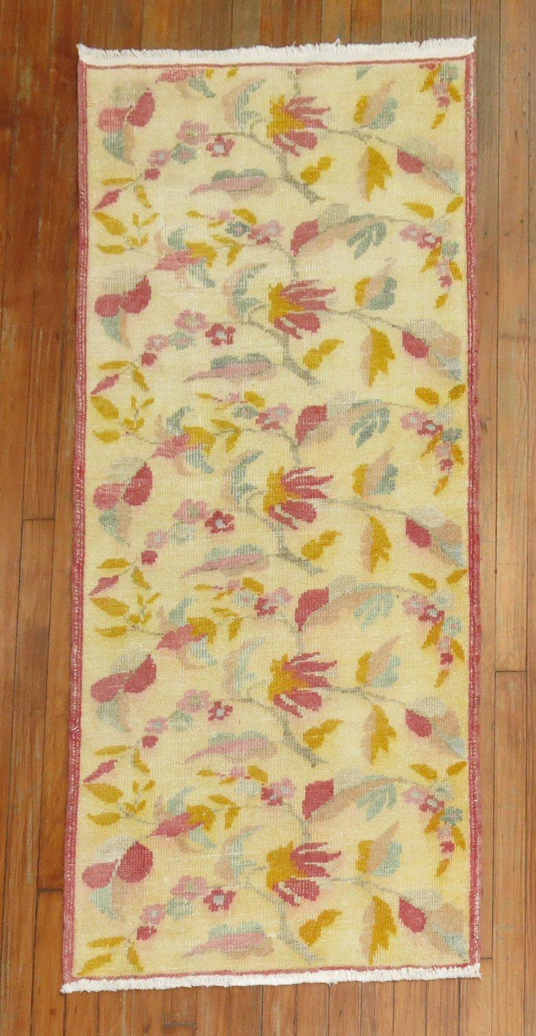 mid 20th century turkish floral rug. Pretty feminine in creams, pink, light blue

Measures: 2'5'' x 5'7''.