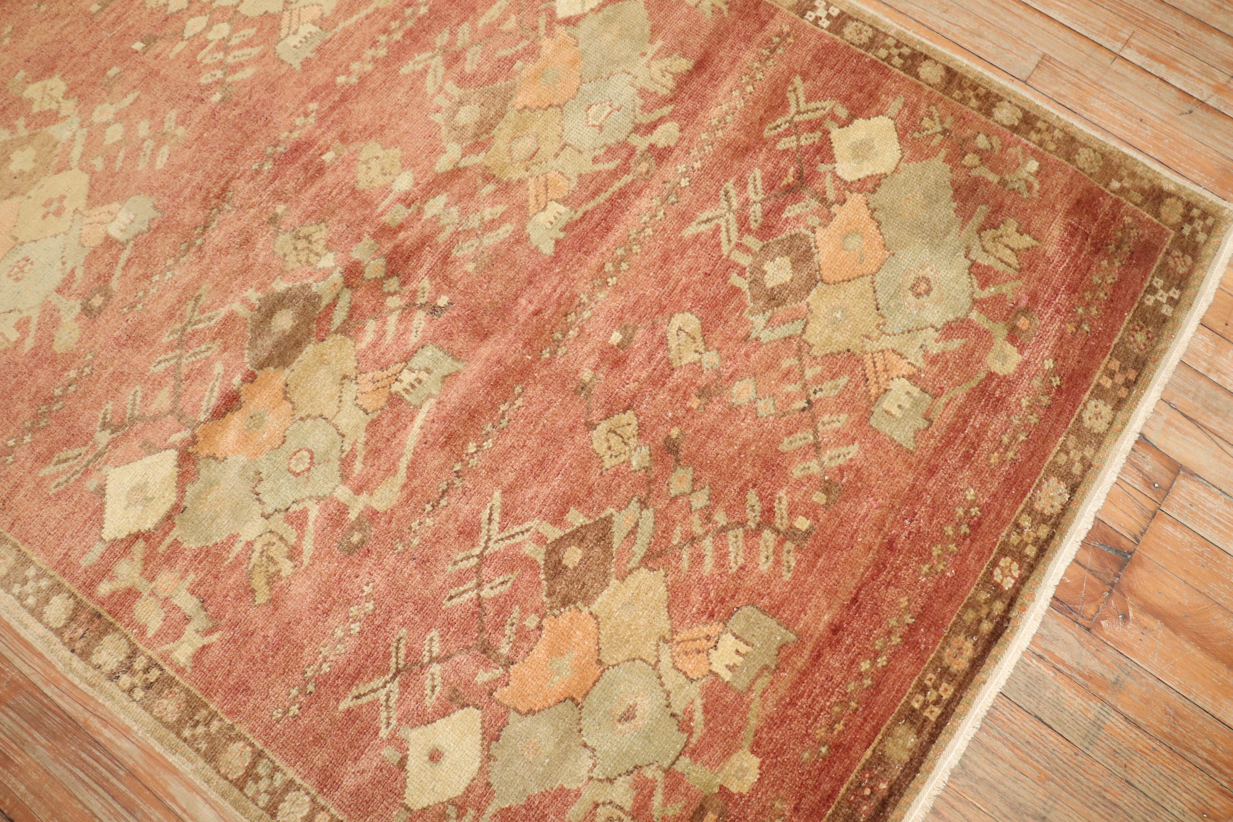 A mid-20th century warm tonal vintage Turkish Konya rug.

4'2'' x 7'10''