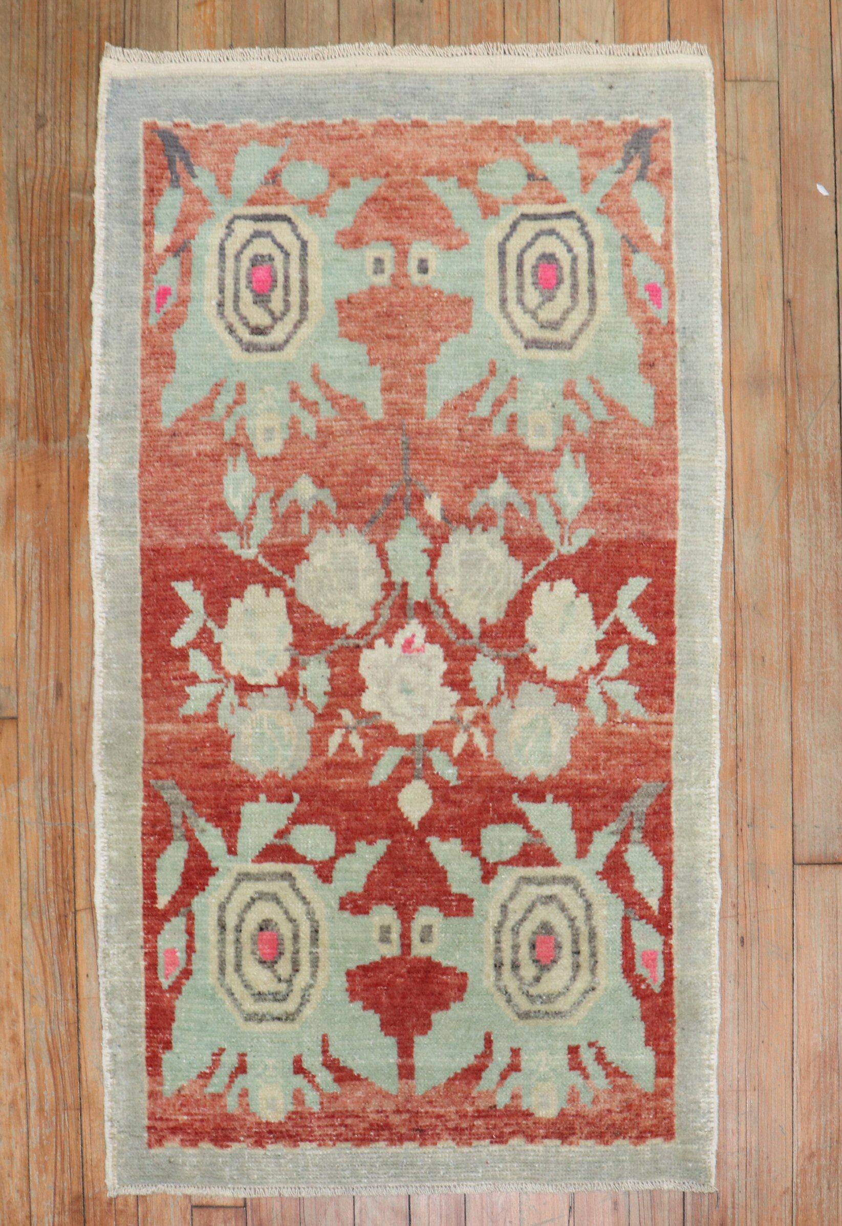 a mid-20th Century Turkish Anatolian Floral Rug

Details
rug no.	31755
size	2' 2