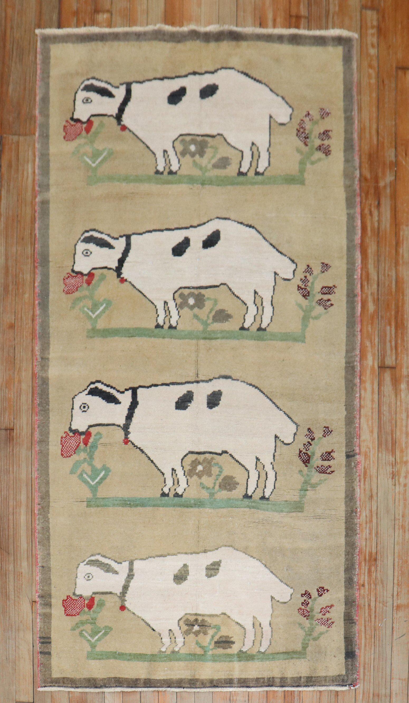 One-of-a-kind mid 20th century decorative caliber vintage Turkish rug with what looks to be 4 lonely sheep or goats on a camel field? tough to say

3'5'' x 6'7''