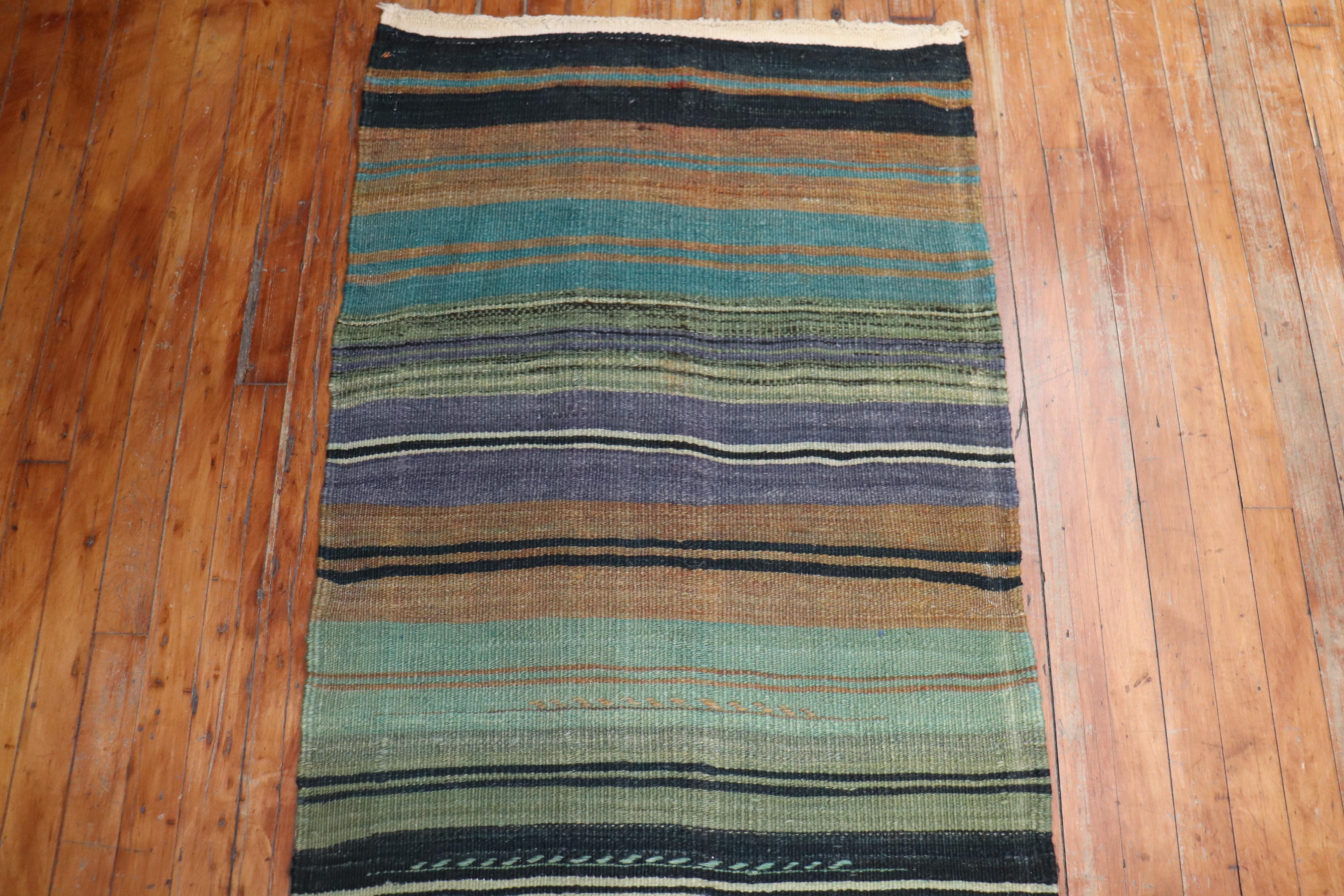 A One of a kind mid 20th century Turkish Kilim Runner with a striped motif

Details
rug no.	r5395
size	2' 5