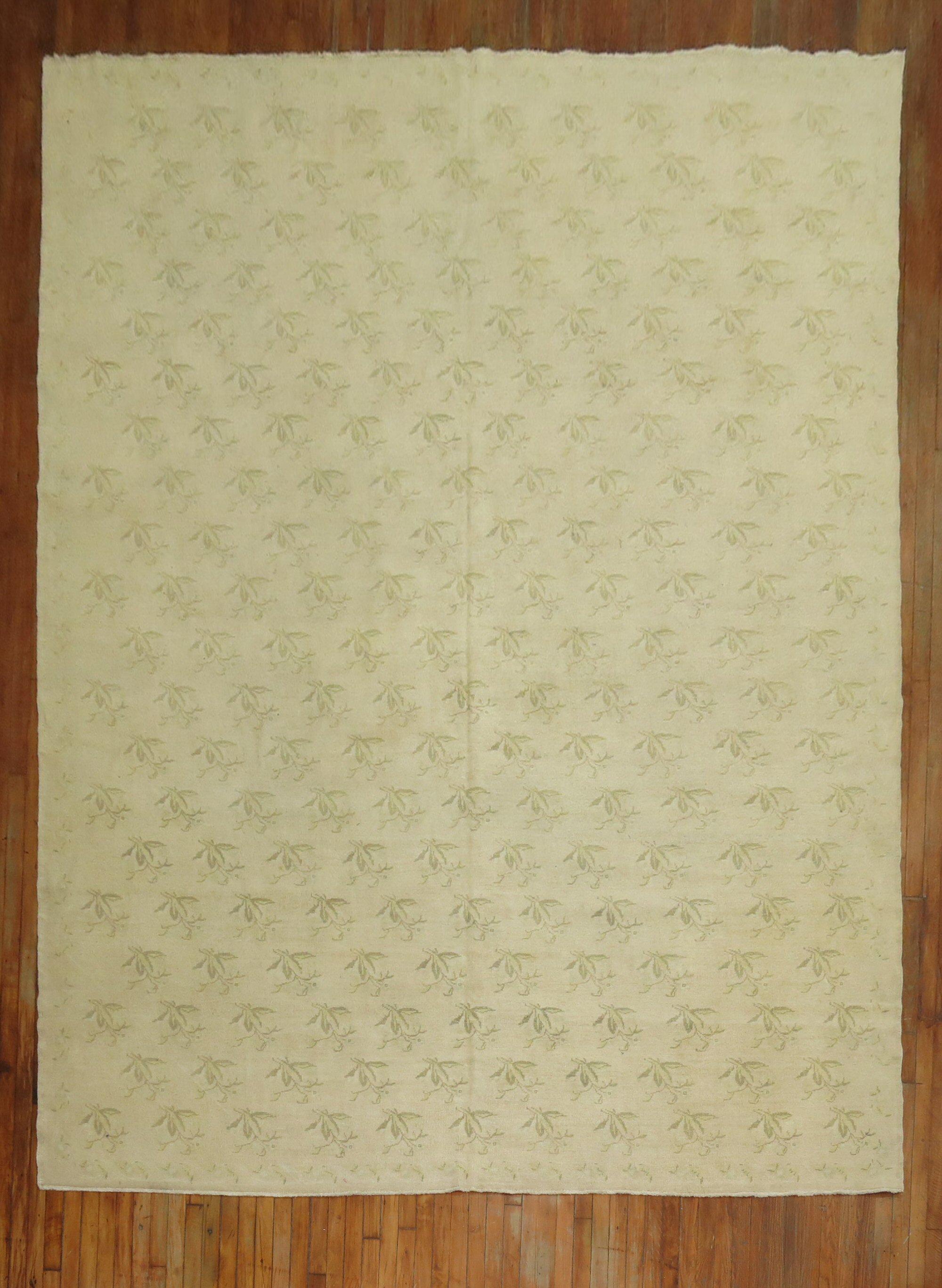 A mid-20th-century Turkish Rug with an all-over floral design in predominantly soft beige, cream, and green tones

Details
rug no.	29911
size	9' 5