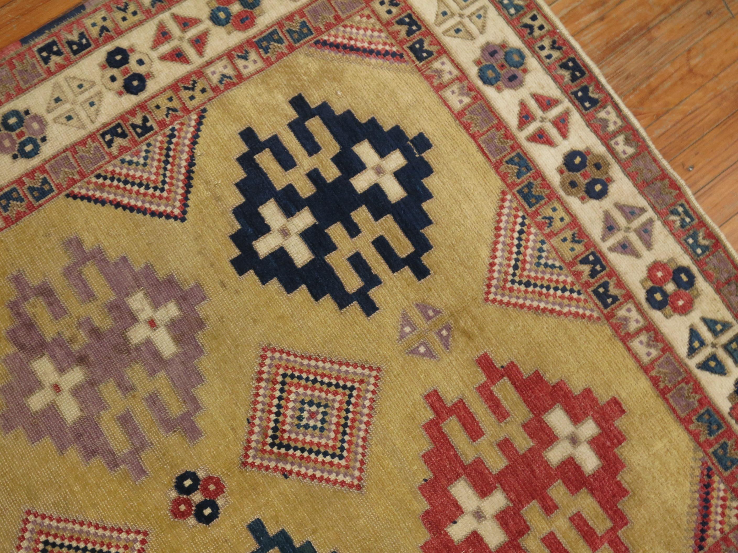 a late 20th century Turkish rug derived from early 20th century Caucasian rugs

4'5'' x 5'3''