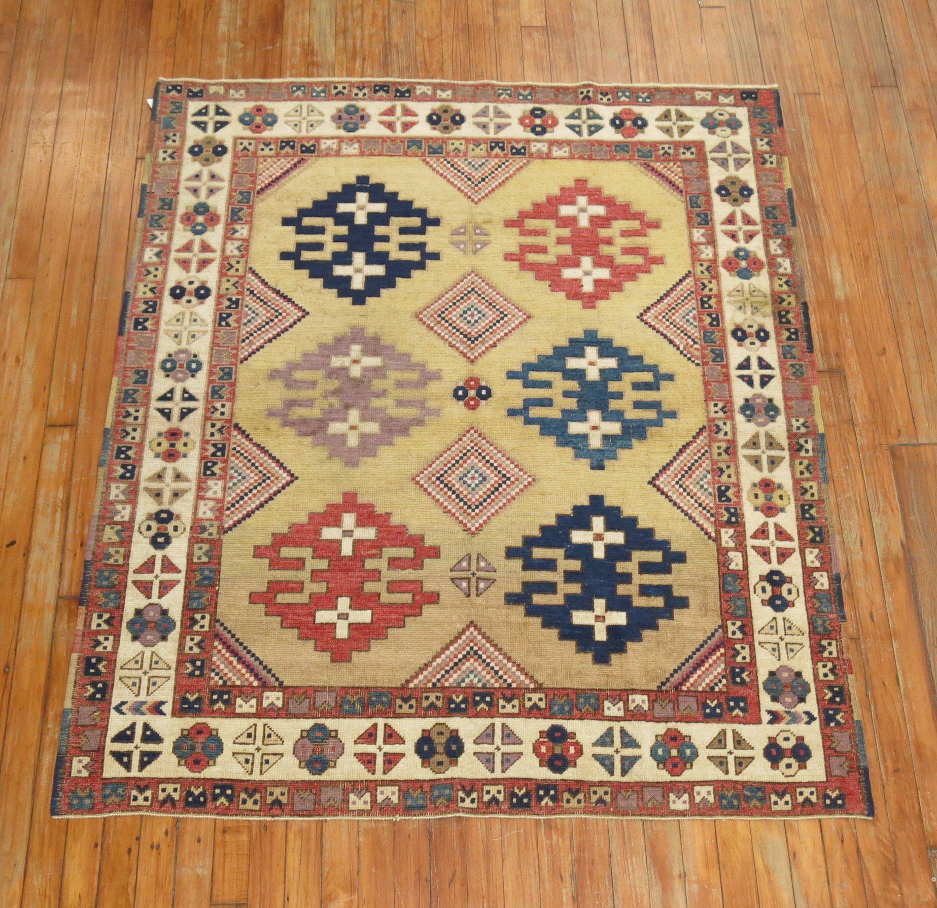 20th Century Zabihi Collection Vintage Turkish Tribal Caucasian Derived Square Accent Rug For Sale