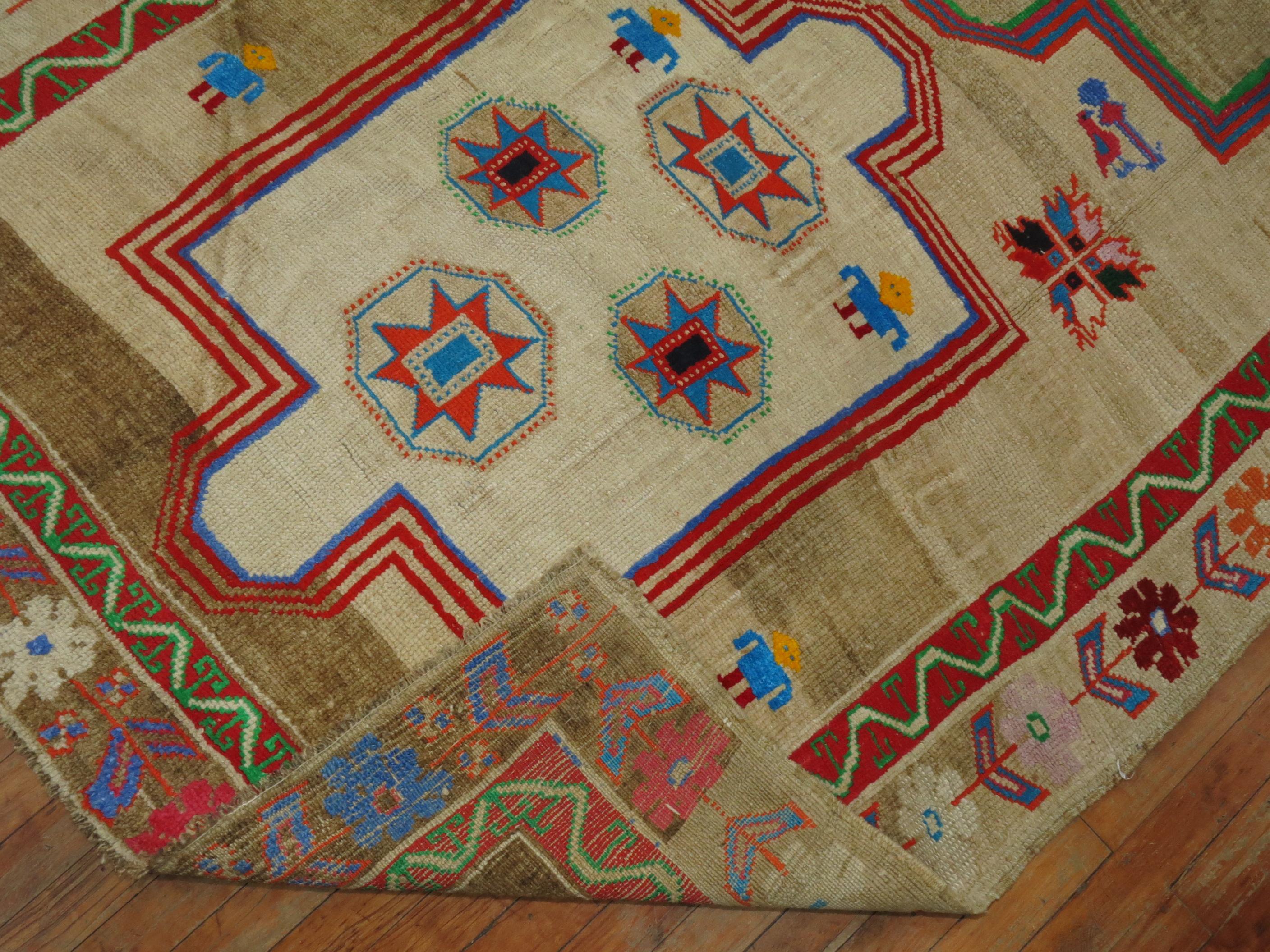 Gallery size Turkish Rug with an abrashed an field with 3 large medallions with predominant accents in neon green, coral, orange and blue. A few small humans are lurking around as well. circa 3rd quarter 20th century

A statement piece that might