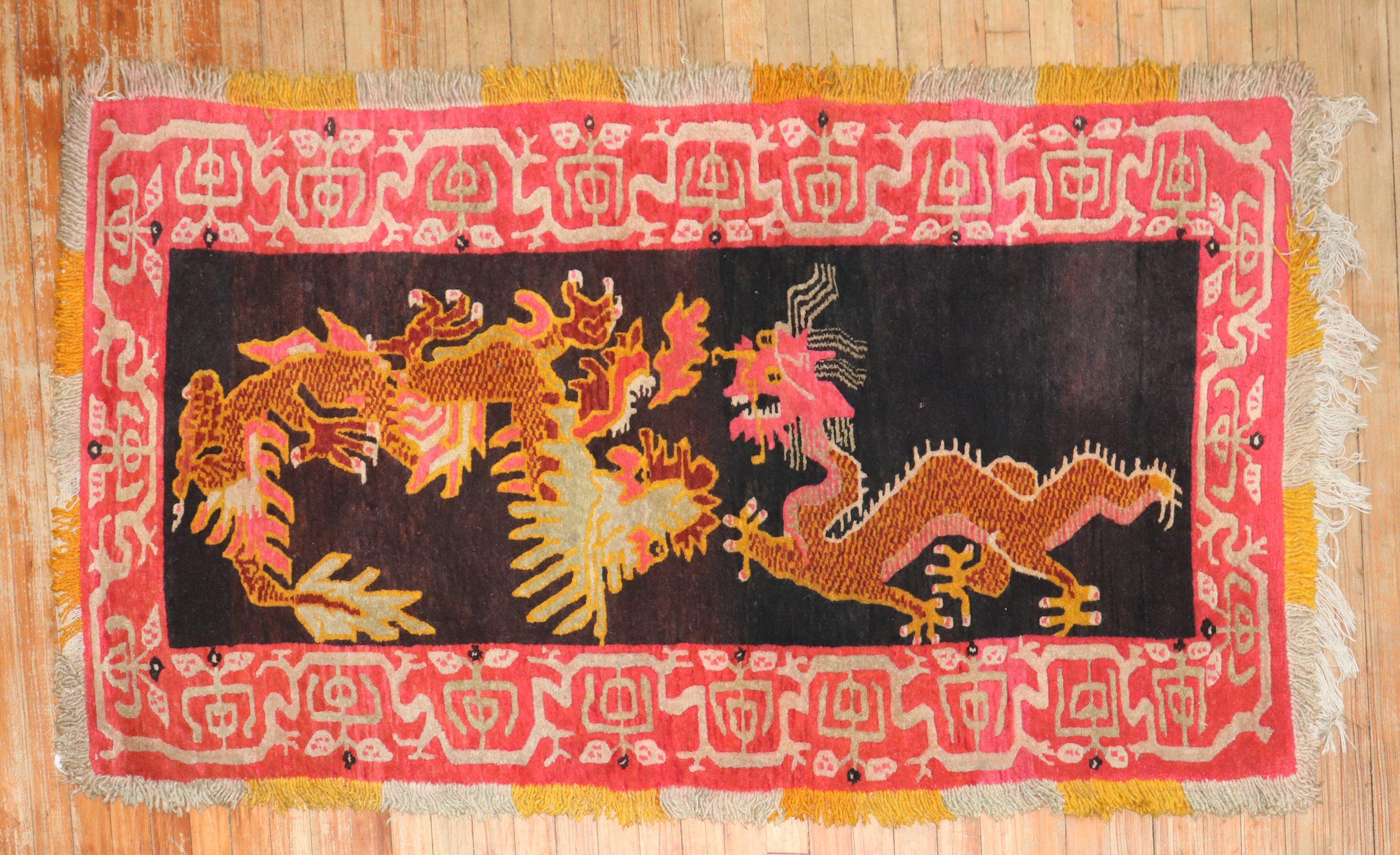 A colorful one-of-a-kind Tibetan rug from the 2nd quarter of the 20th century with a dragon motif 

Measures: 3' x 5'5''.