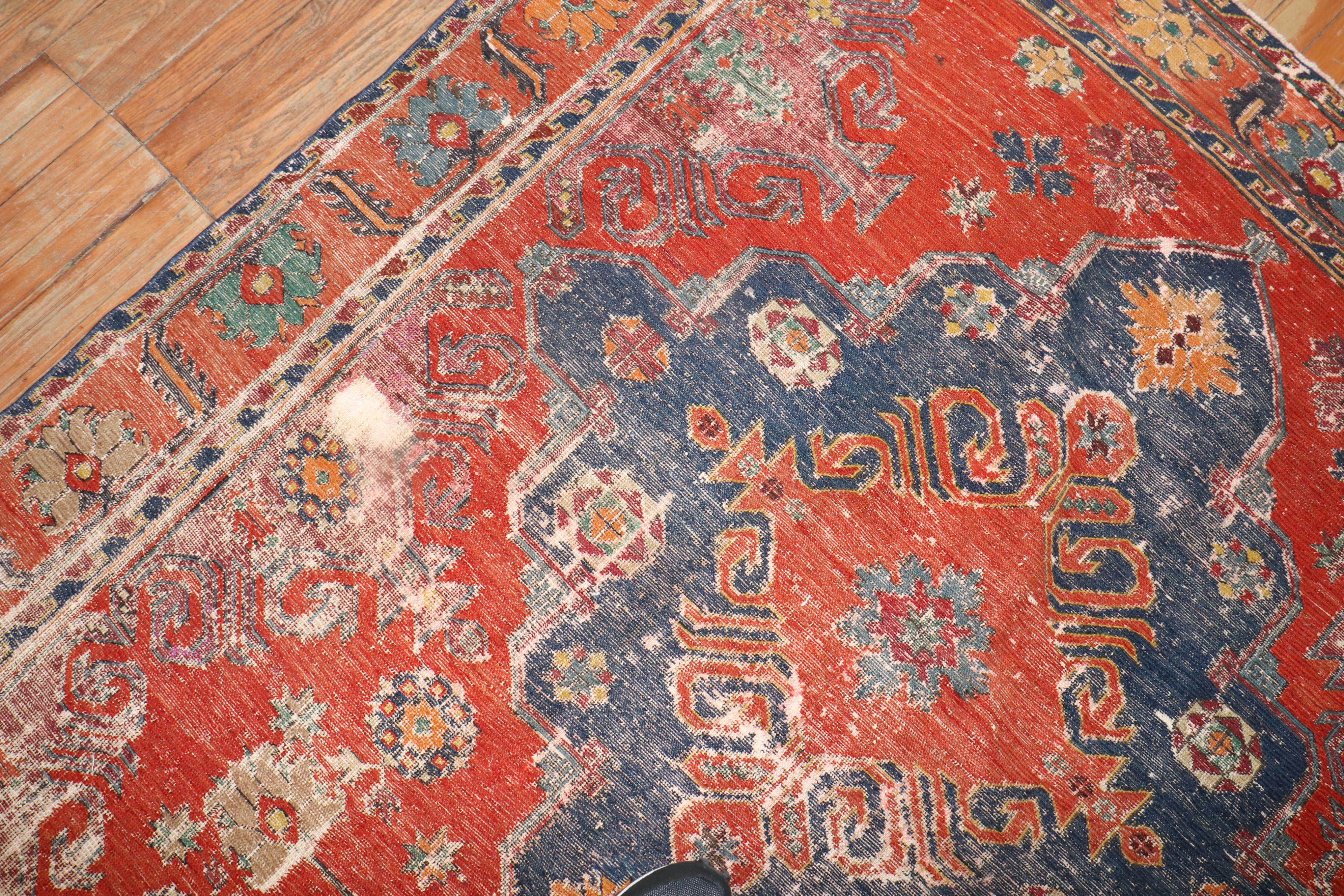 Zabihi Collection Worn Antique Caucasian Soumac Flatweave Gallery Size Rug In Distressed Condition For Sale In New York, NY