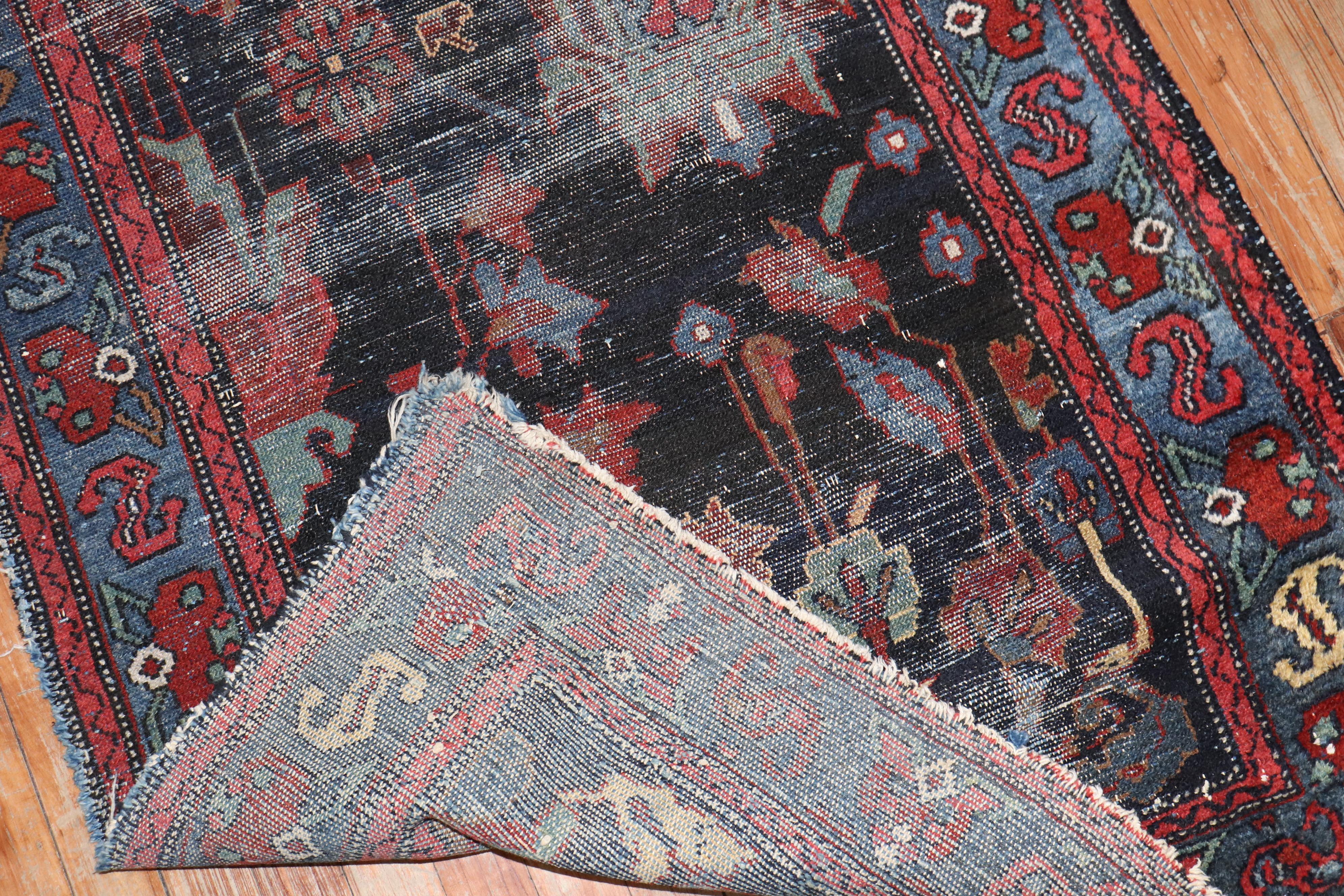 an early 20th - century worn persian runner

Measure: 3'2'' x 9'11''.