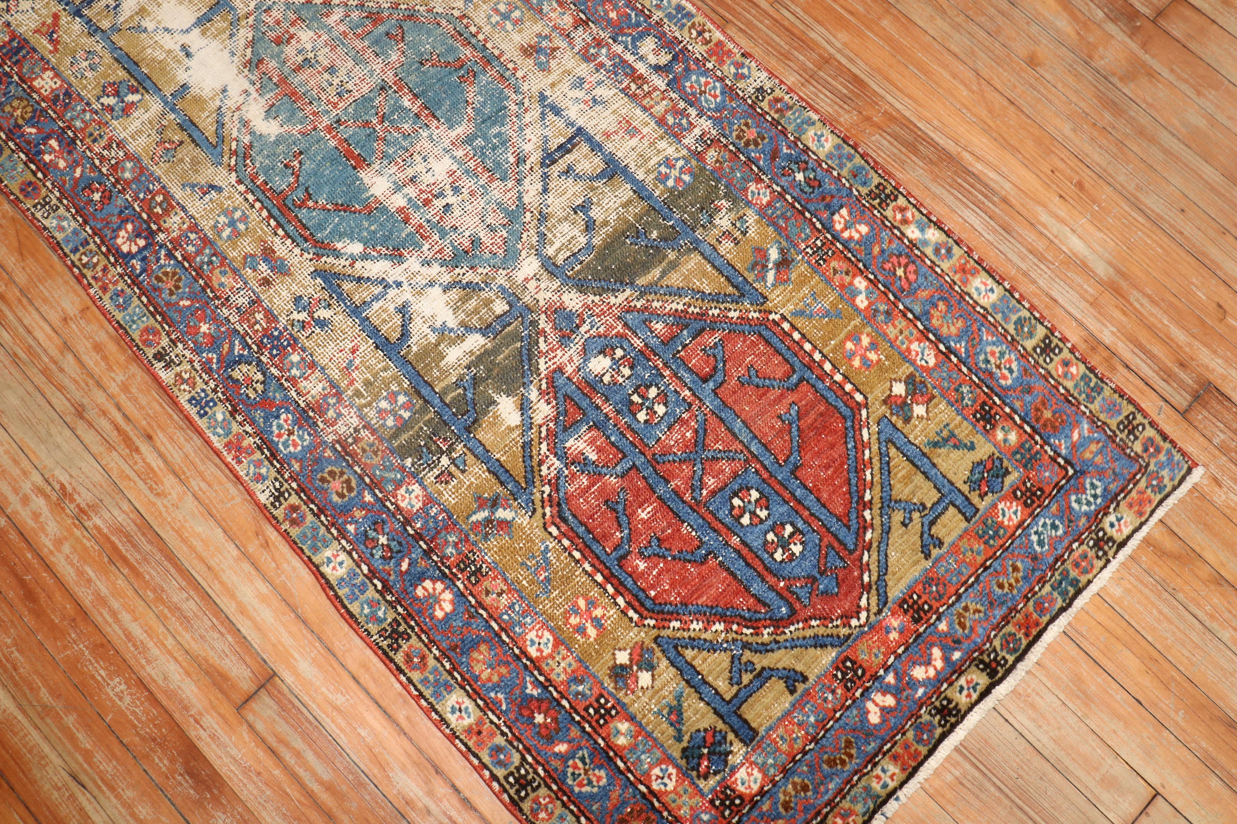 an early 20th -century Worn Persian Runner

Measure: 2'9'' x 10'7''.