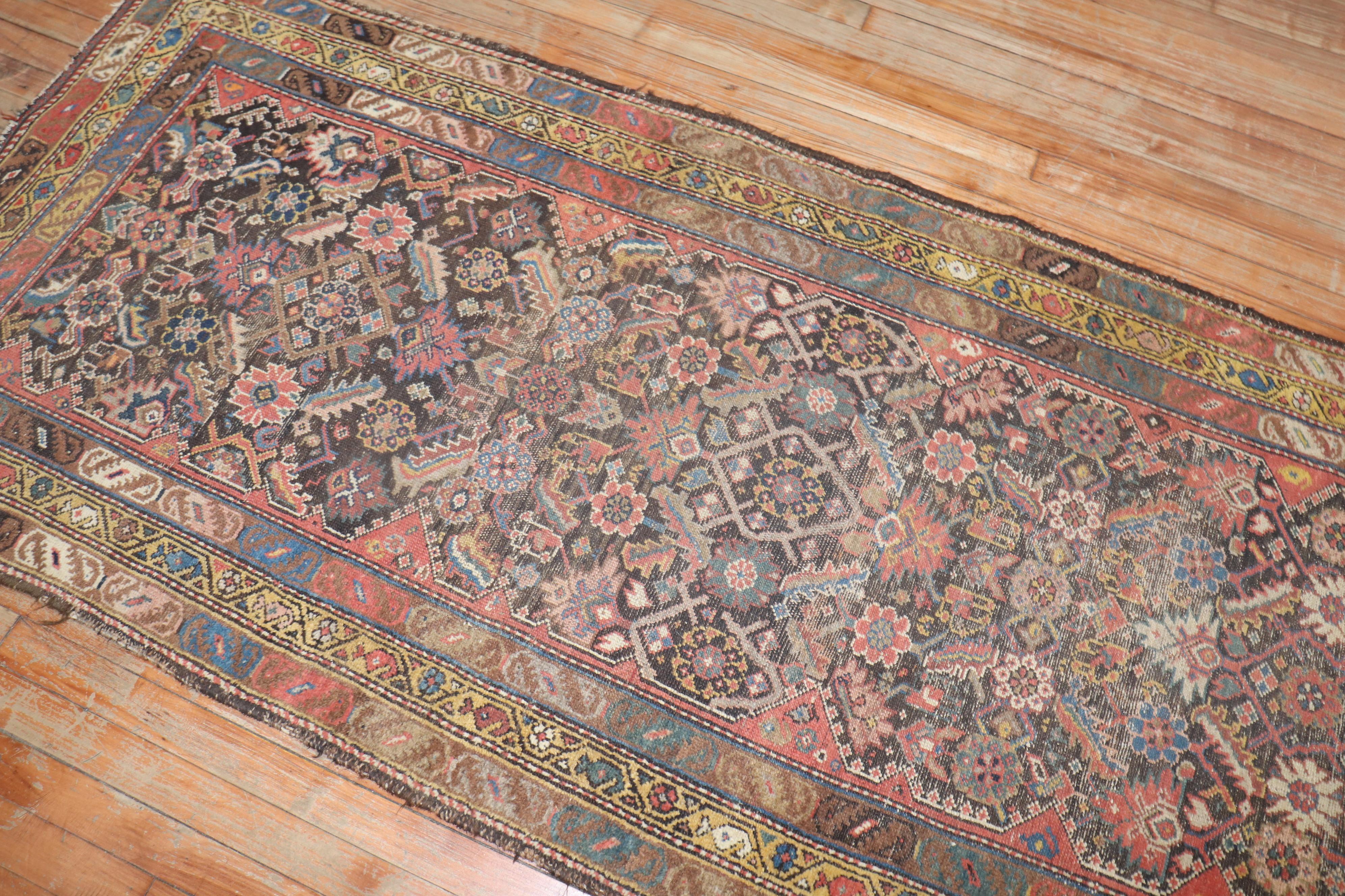 an early 20th -century Worn Persian Runner

Measure: 3'4'' x 8'7''.