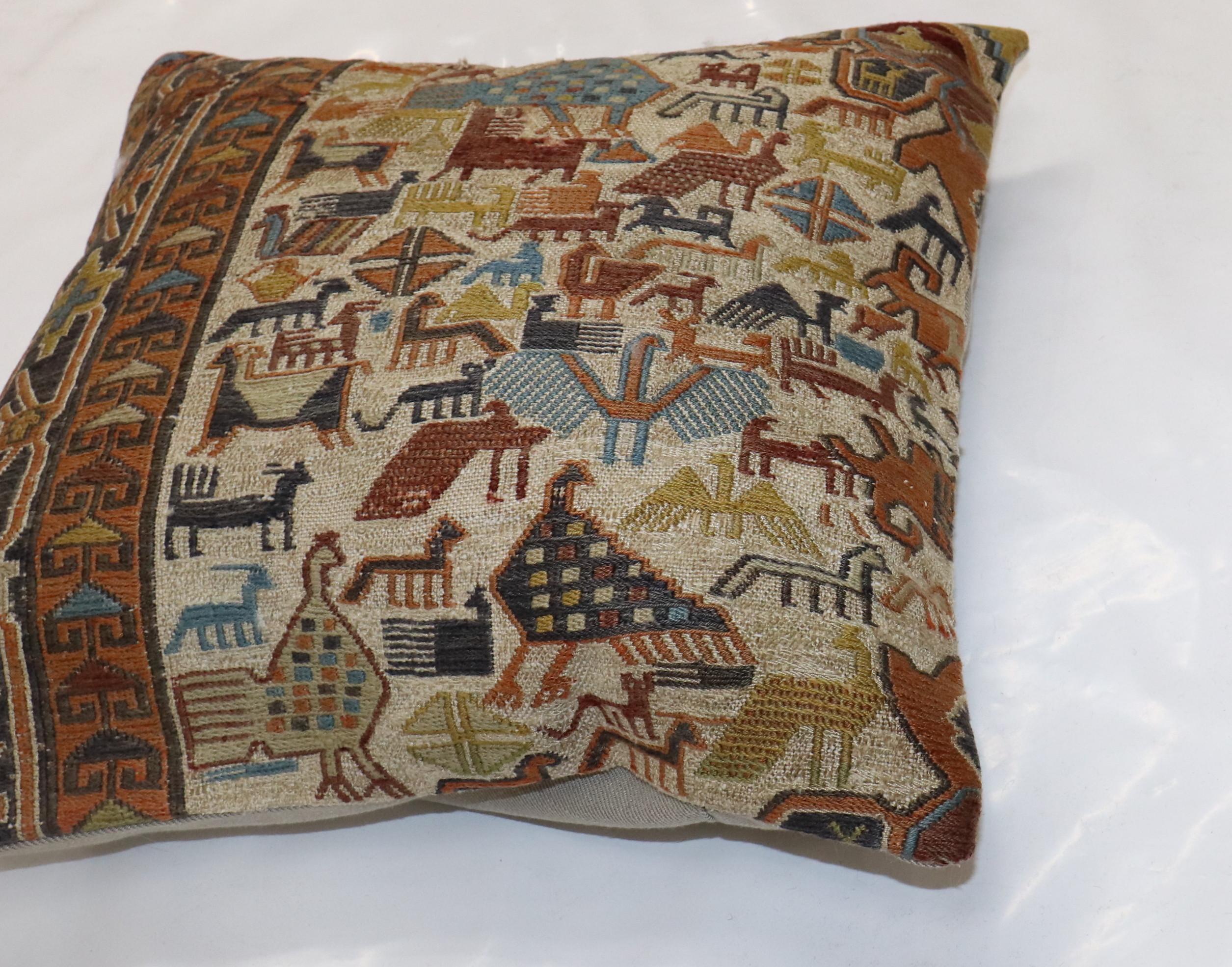 One-of-a-kind Pillow made from a flat-weave Persian early 20th-century soumac flat-weave consisting of an animal pattern.

19'' x 19''
