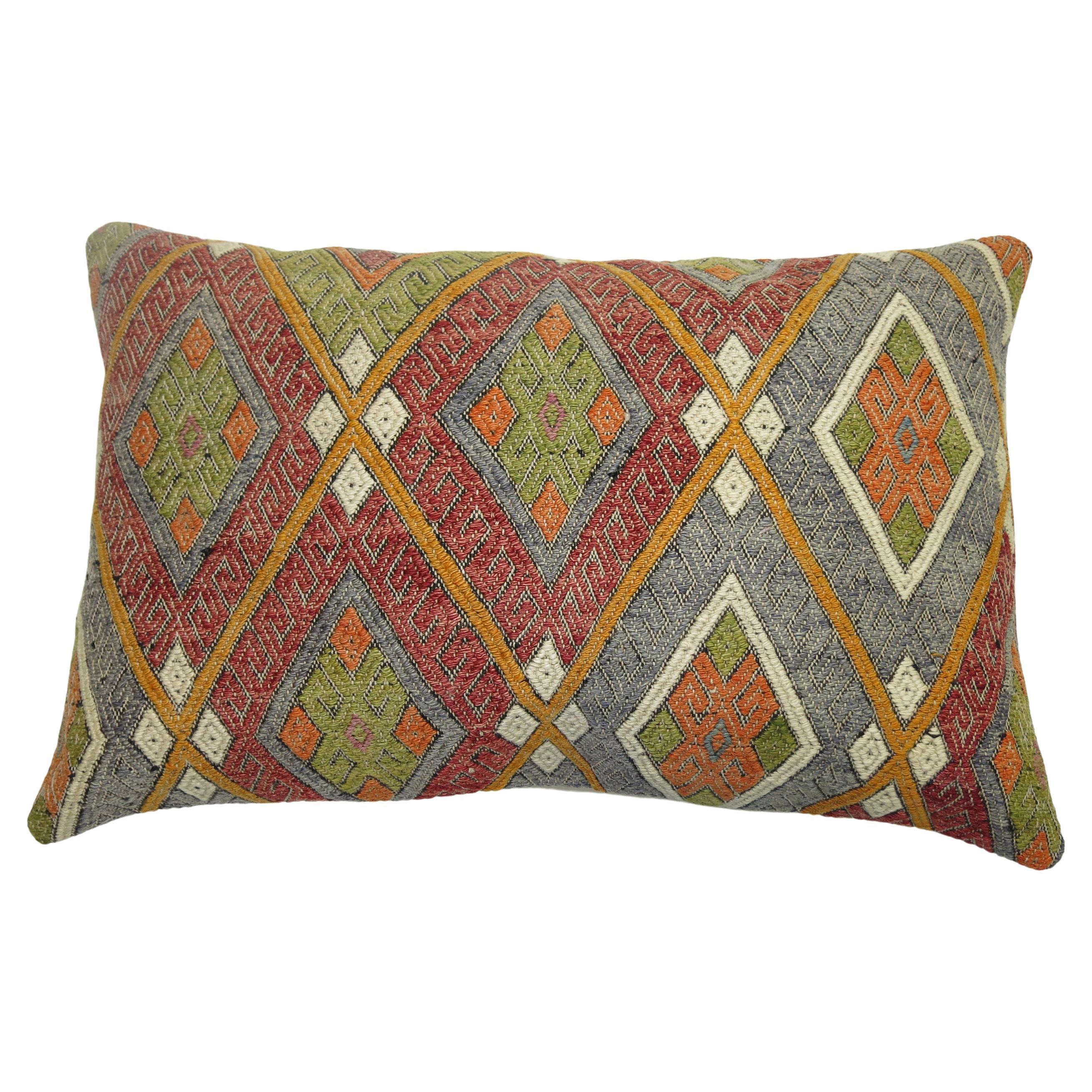 Pillow made from a cicim Turkish flat-weave technique pillow.

Size: 17