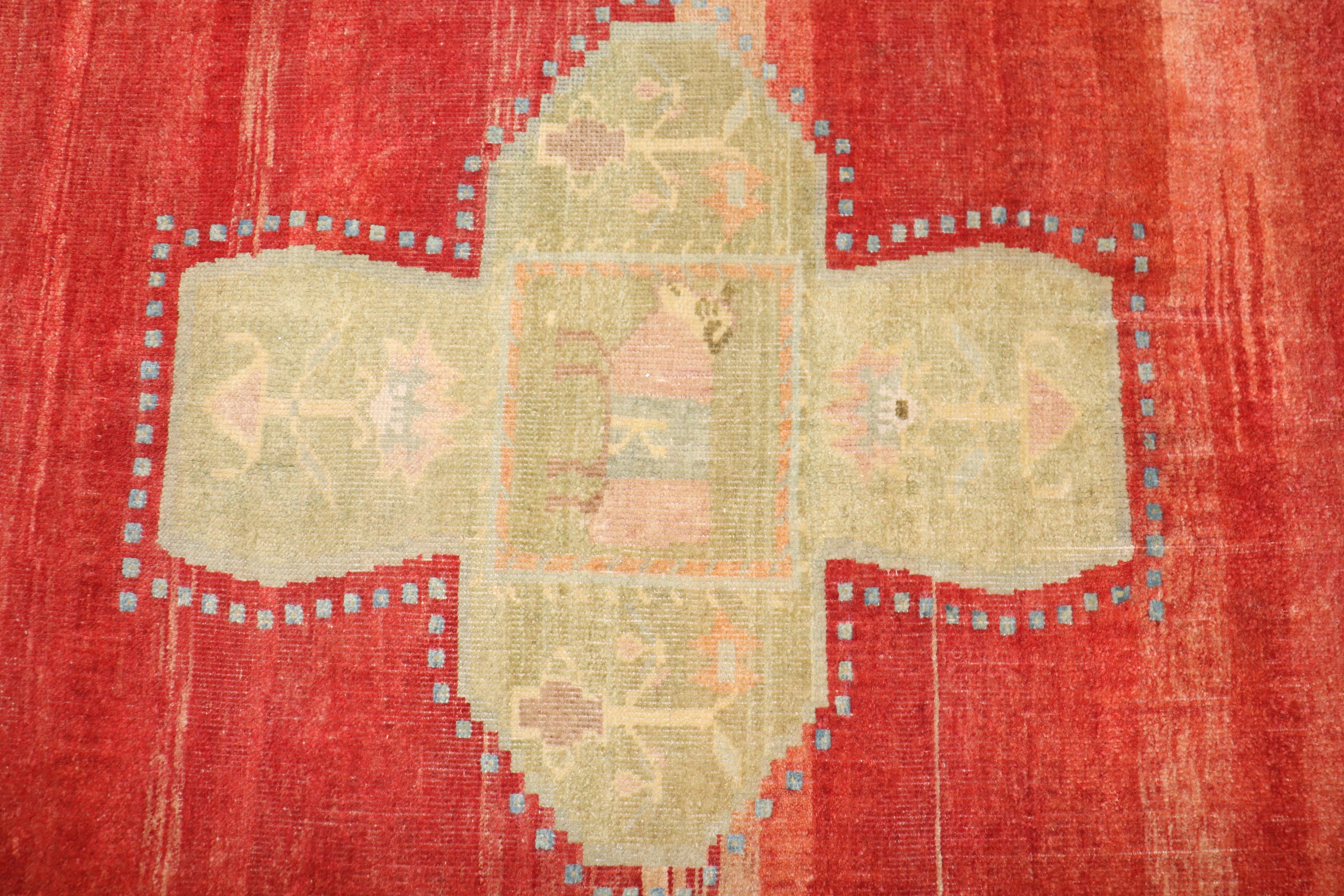A Primitive early 20th-century Turkish Kars Village Rug with an open field design on a abrashed red ground dated 1906 

Details
rug no.	j2516
size	6' 7