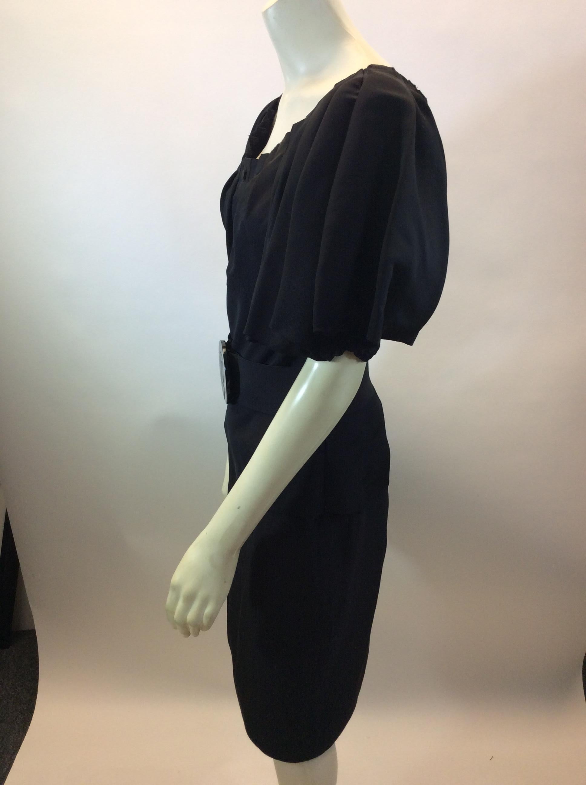 Zac Posen Black Three Piece Skirt Set
$299
Made in the US
100% Silk
Size 6
Skirt:
Length 23.5