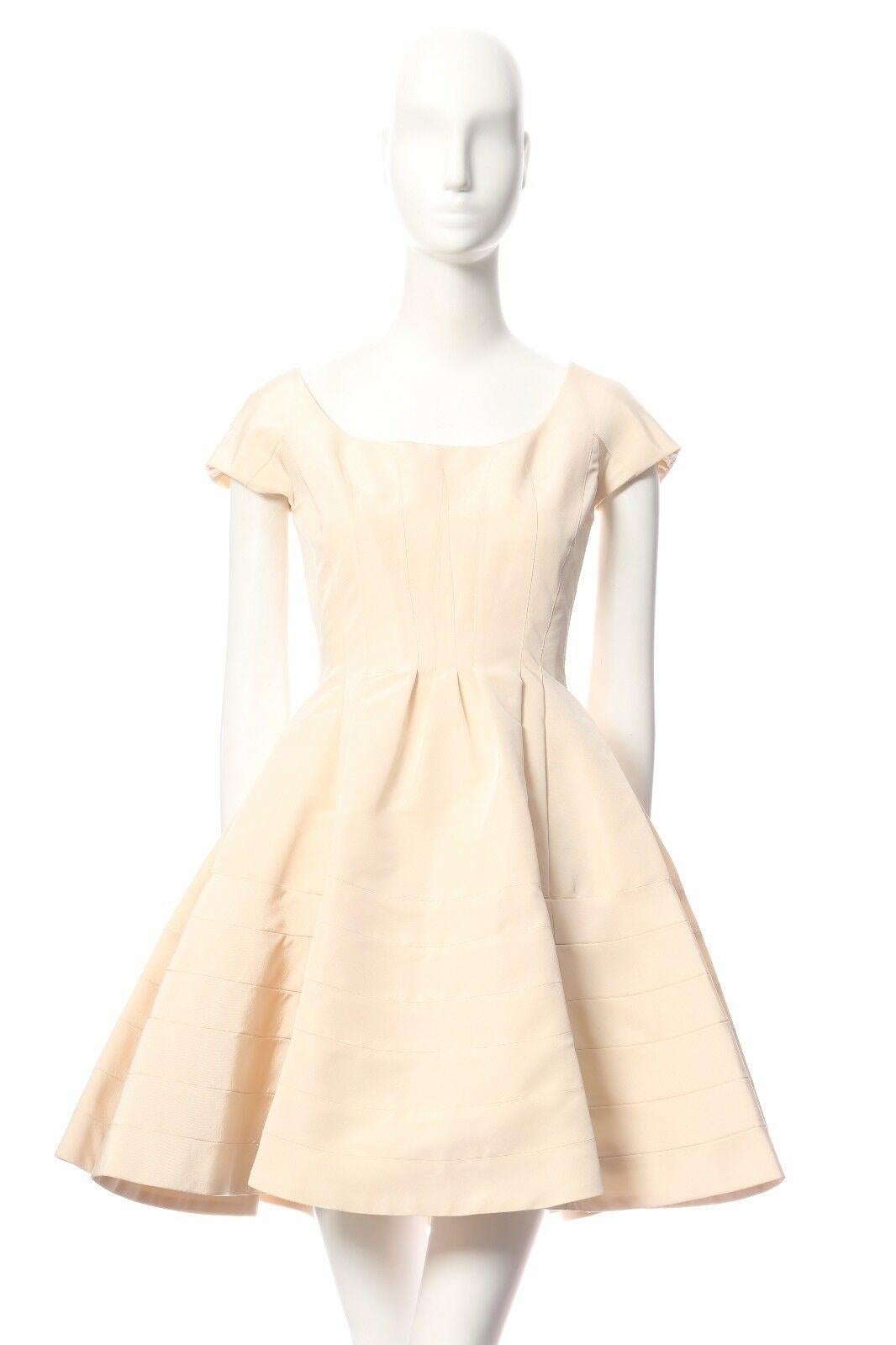 ZAC POSEN cream beige 100% silk cap sleeve paneled constructed flared dress US0
Brand: Zac Posen
Designer: Zac Posen
Model Name / Style: Silk dress
Material: Silk
Color: Beige
Pattern: Solid
Closure: Zip
Lining material: Silk
Extra Detail: Short