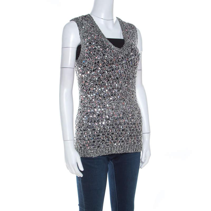 This vest from Zac Posen is a sight to admire. Made from a cotton blend and laid with sequin paillette embellishments  the vest sparkles in a fashionable way. Team it with plain trousers or skirts and let it shine.
