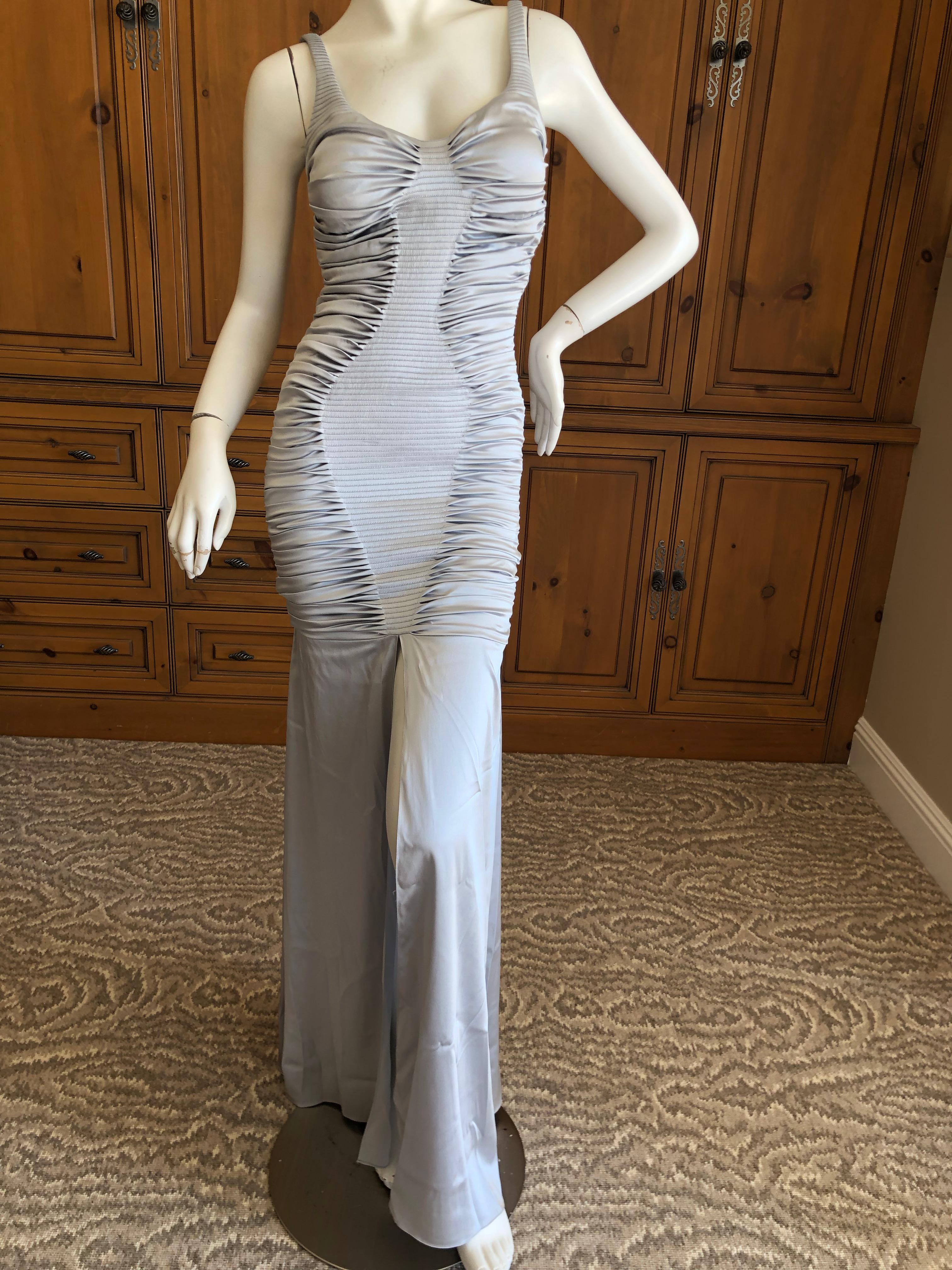 Zac Posen Ruched Silver Silk Mermaid Gown with High Slit
This is so beautiful, please see all the photos.
The original owner had foam cups in the bust, they can be removed , but my mannequin never looked so curvy.
There is a lot of stretch
 Size