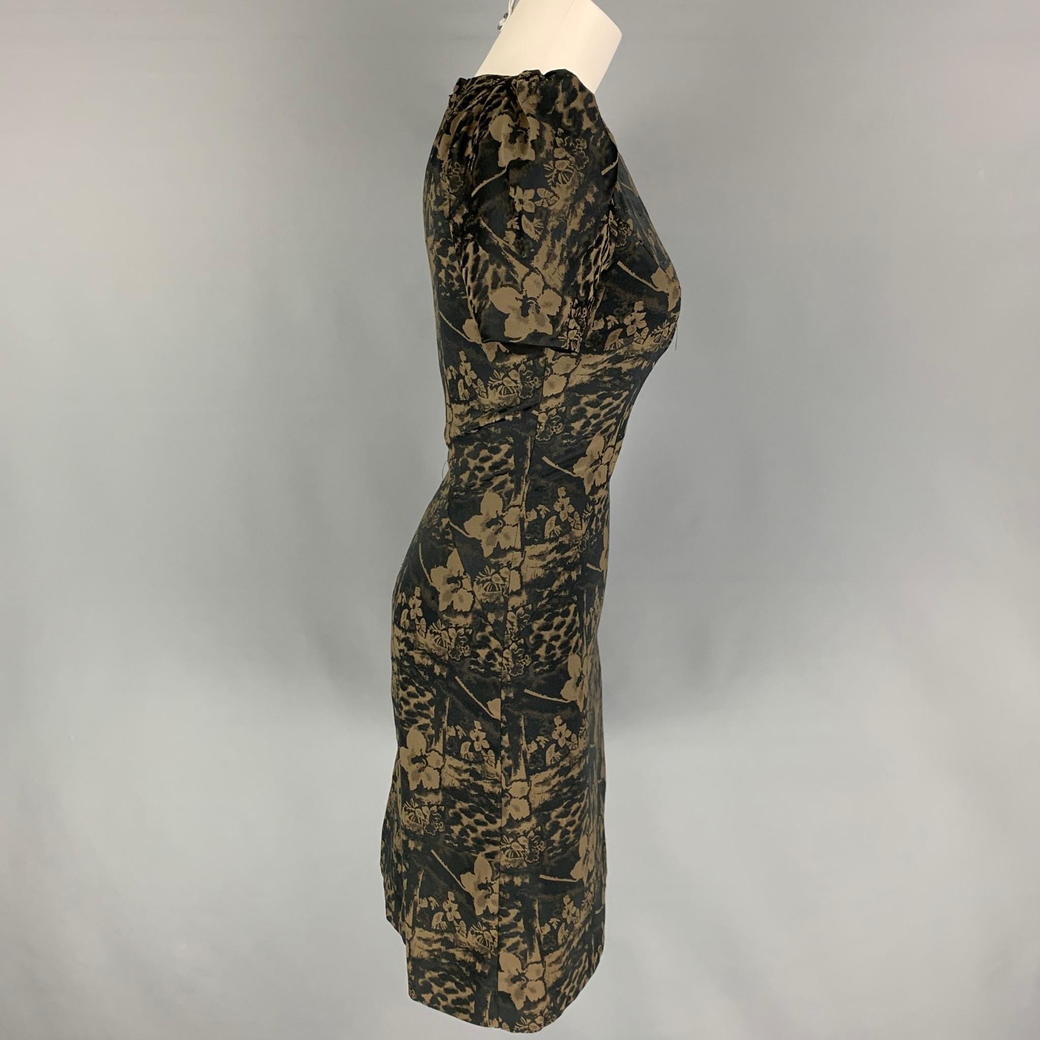 ZAC POSEN dress comes in a olive & black floral material featuring ruched sleeves and back zip up closure. 

Very Good Pre-Owned Condition.
Marked: Size tag removed.

Measurements:

Shoulder: 15 in.
Bust: 31 in.
Waist: 26 in.
Hip: 33 in.
Sleeve: 6